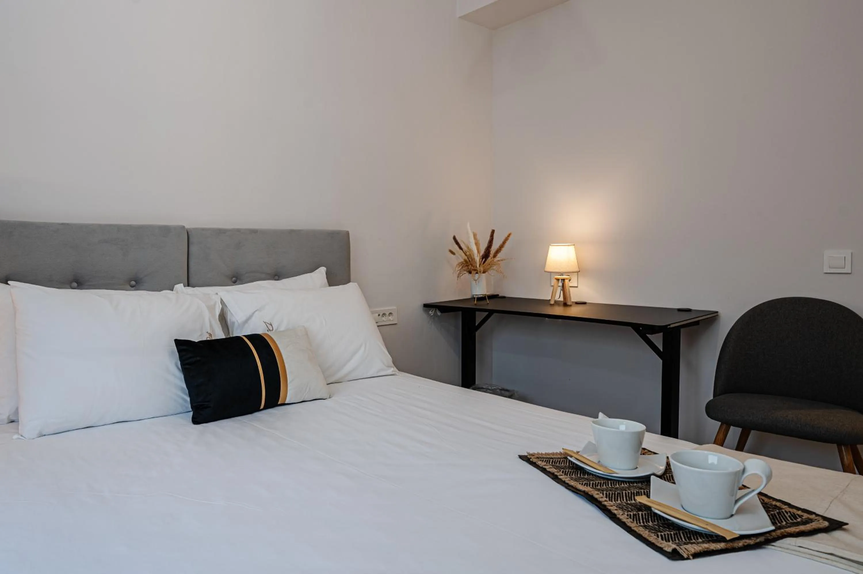 Bed in AMINA APARTMENTS