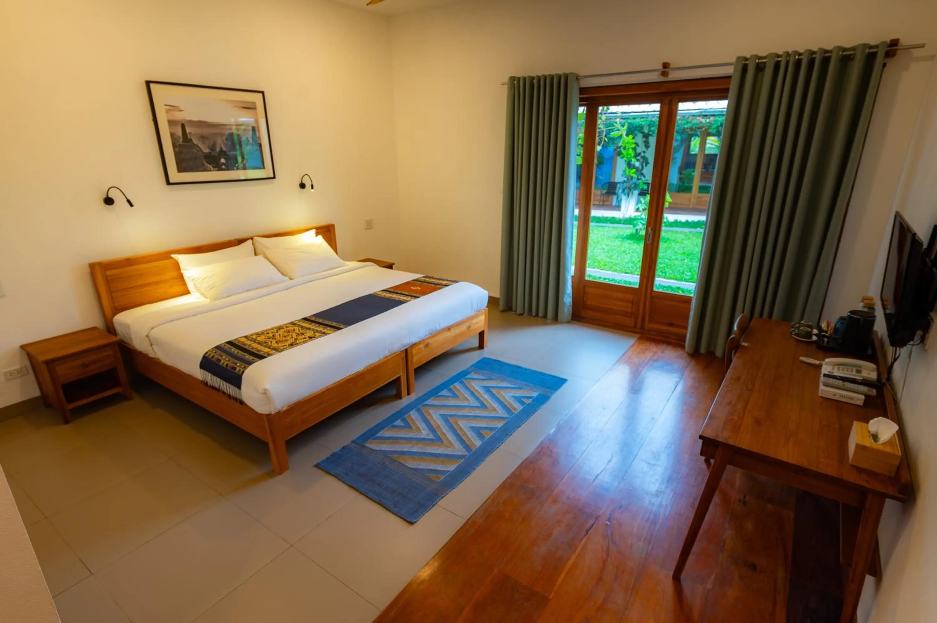 Photo of the whole room, Bed in Madilao Hotel