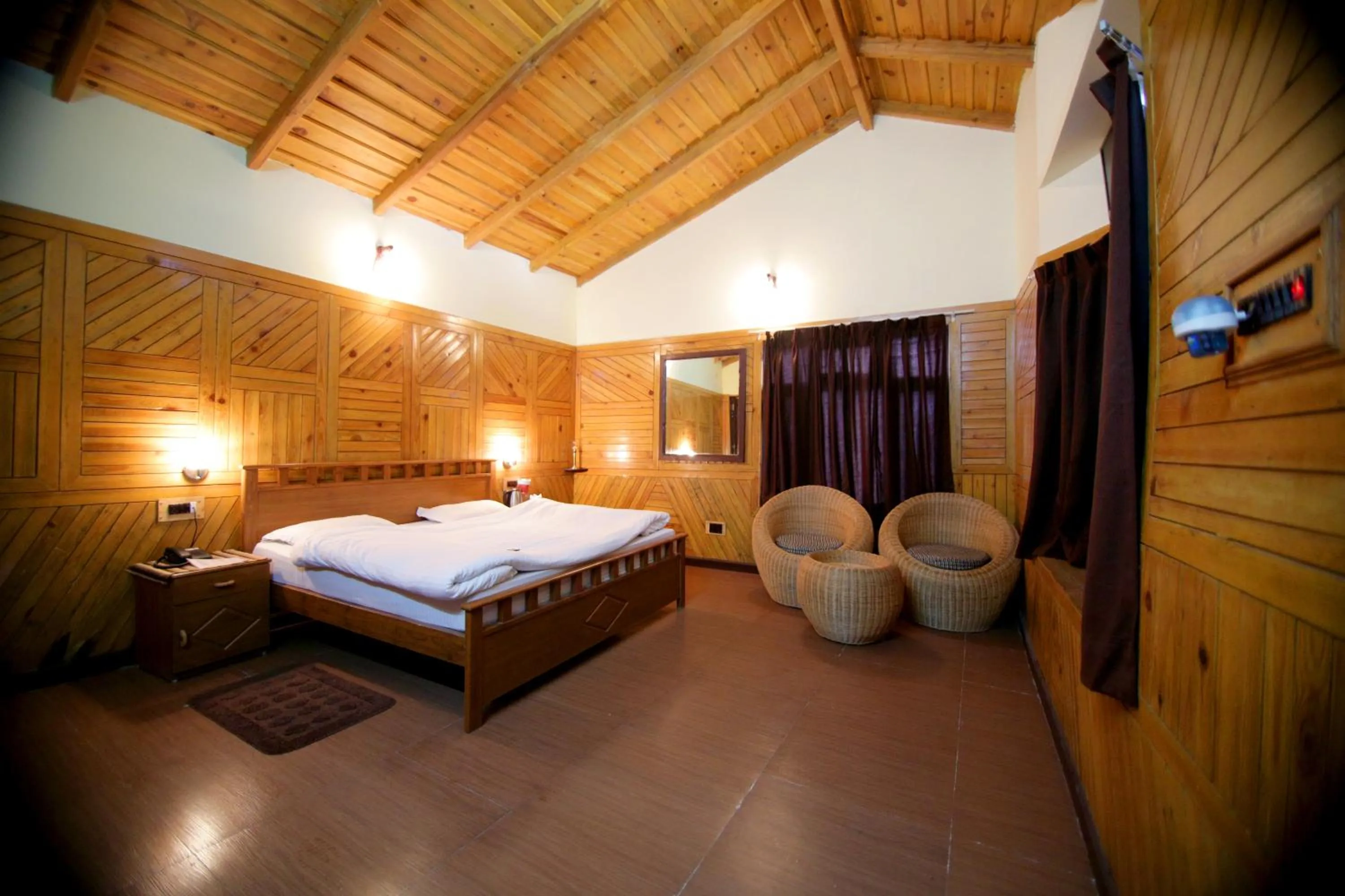 Bedroom in Ashoka Naini Chalet