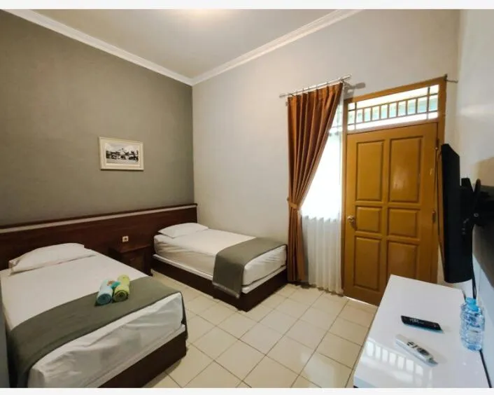 Bedroom, Bed in Caniga Hotel Yogyakarta