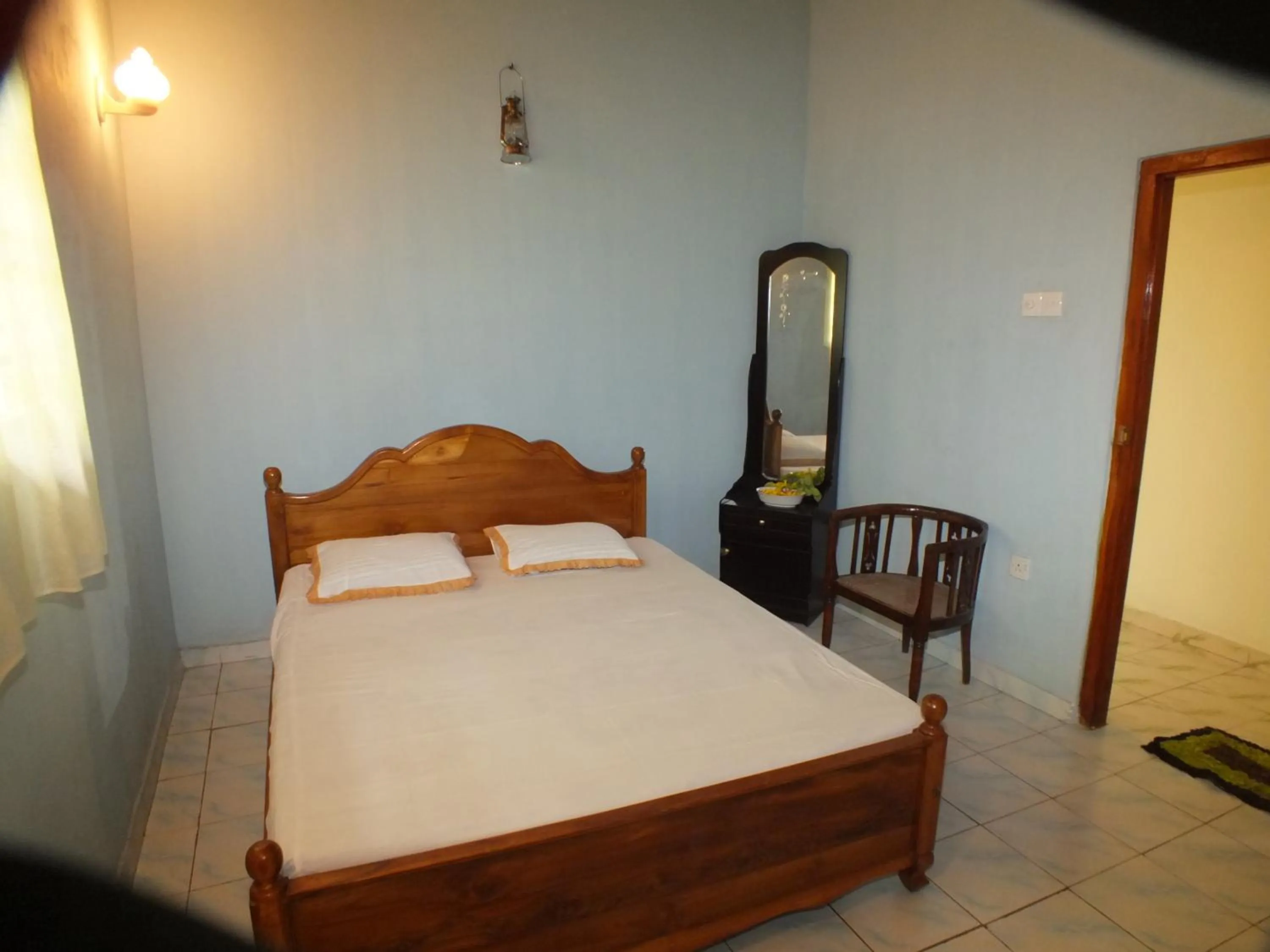 Bed in Arogya Resort