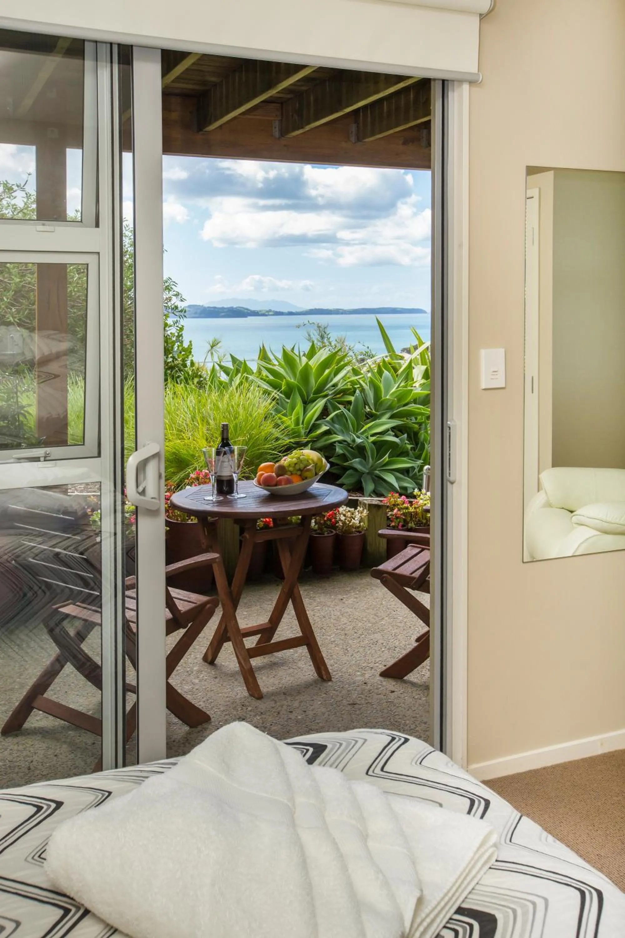 Patio, Bed in Tahi Lodge - Matakana Coast