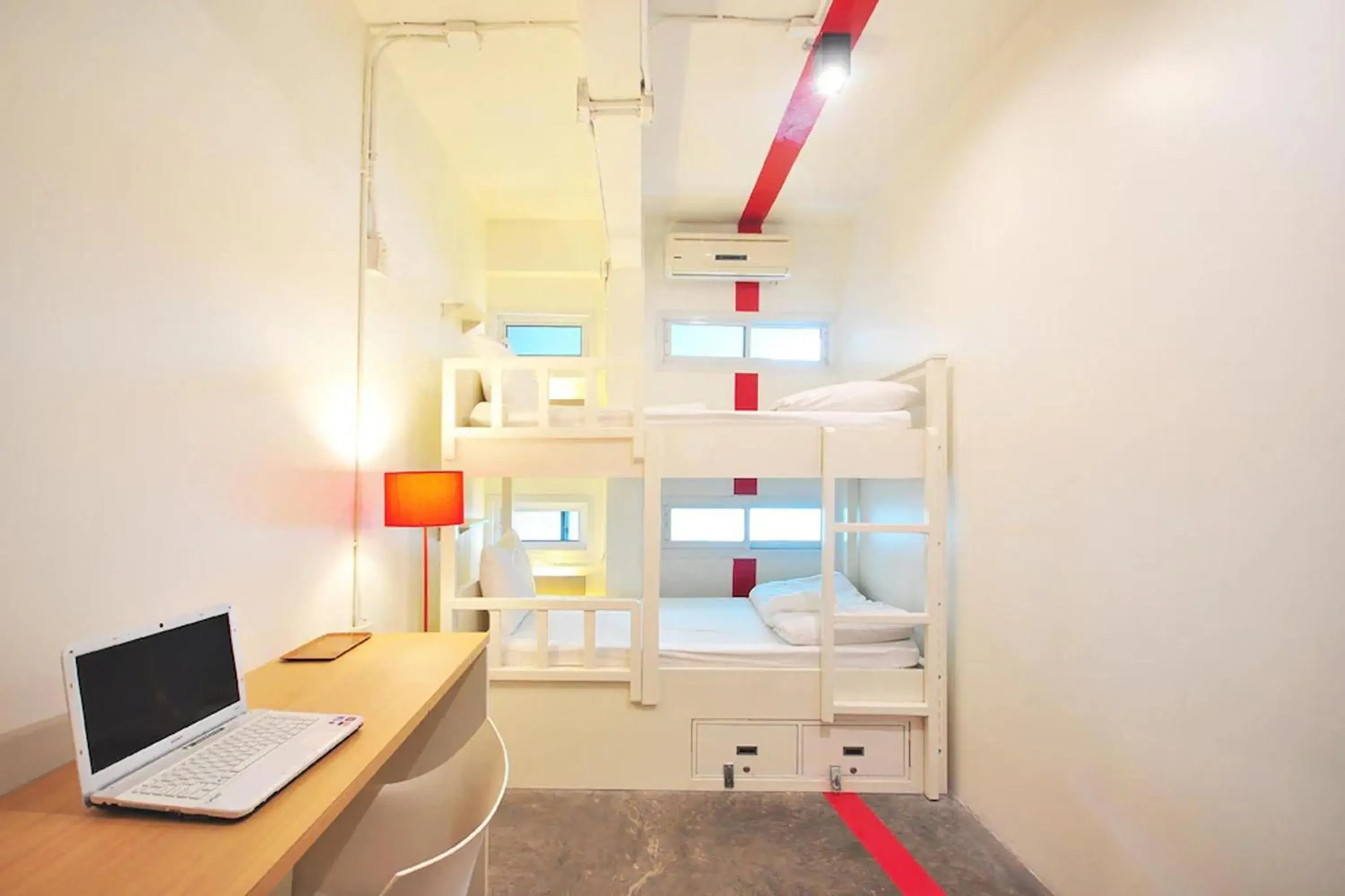 Twin bunk bed with Shared Bathroom (upper floor) in Qilombo Hostel Silom Twin bunk bed with Shared Bathroom (upper floor) in Qilombo Hostel Silom