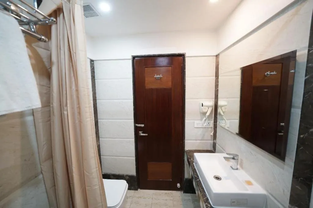 Bathroom in Square Inn Hotel