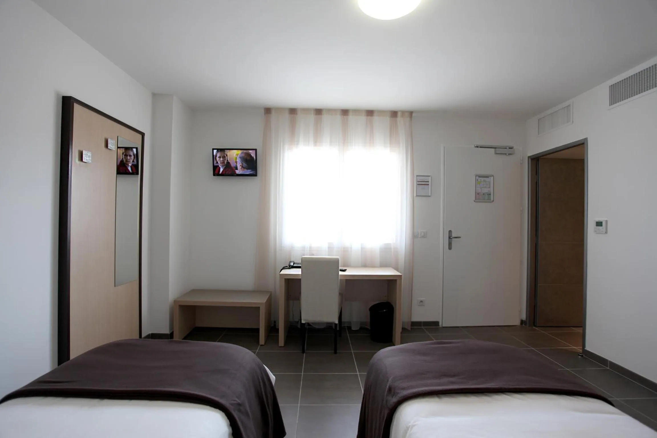 Photo of the whole room, Bed in Hôtel Restaurant les Pielettes