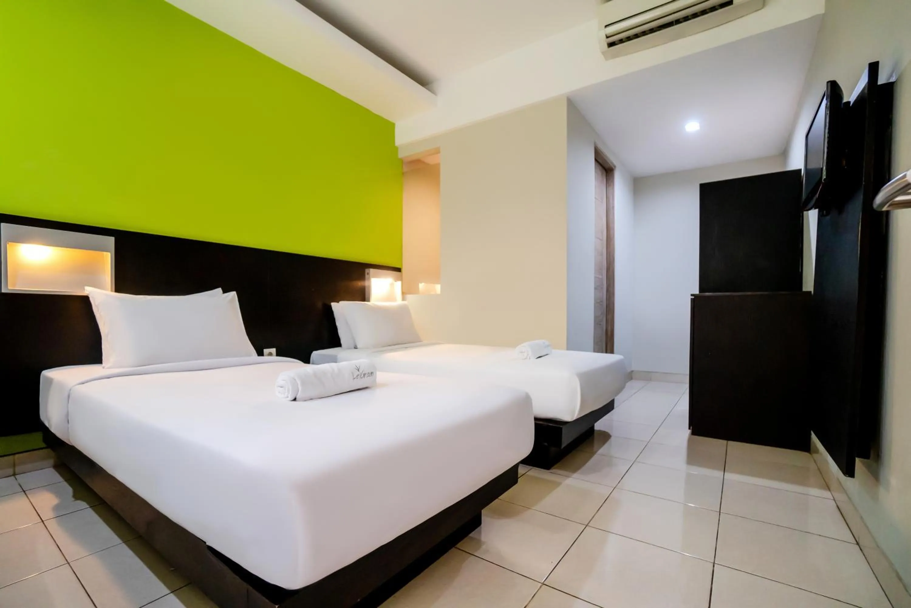 Bed in LeGreen Suite Pejompongan