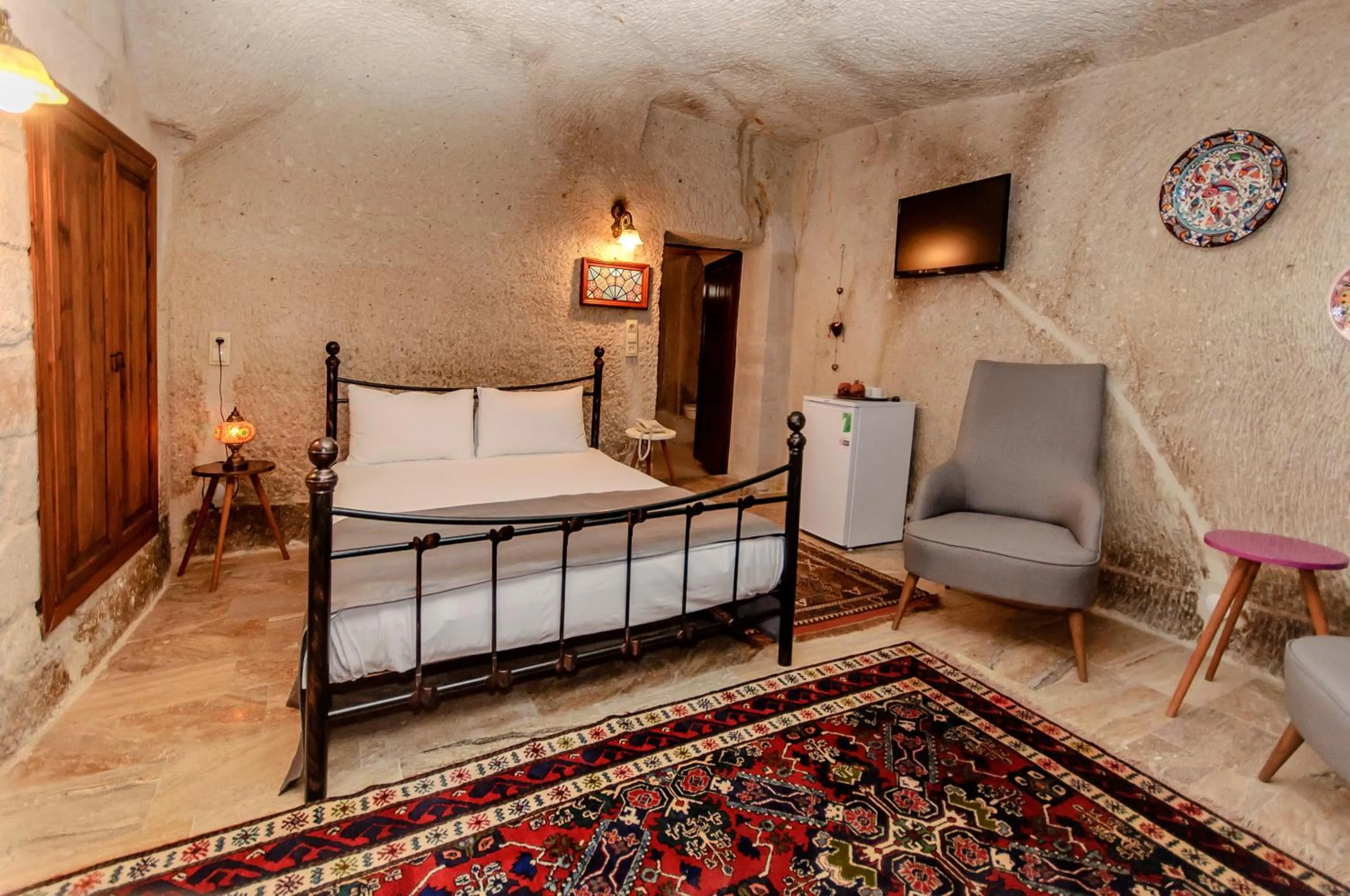 Bed in Nessa Cave Hotel