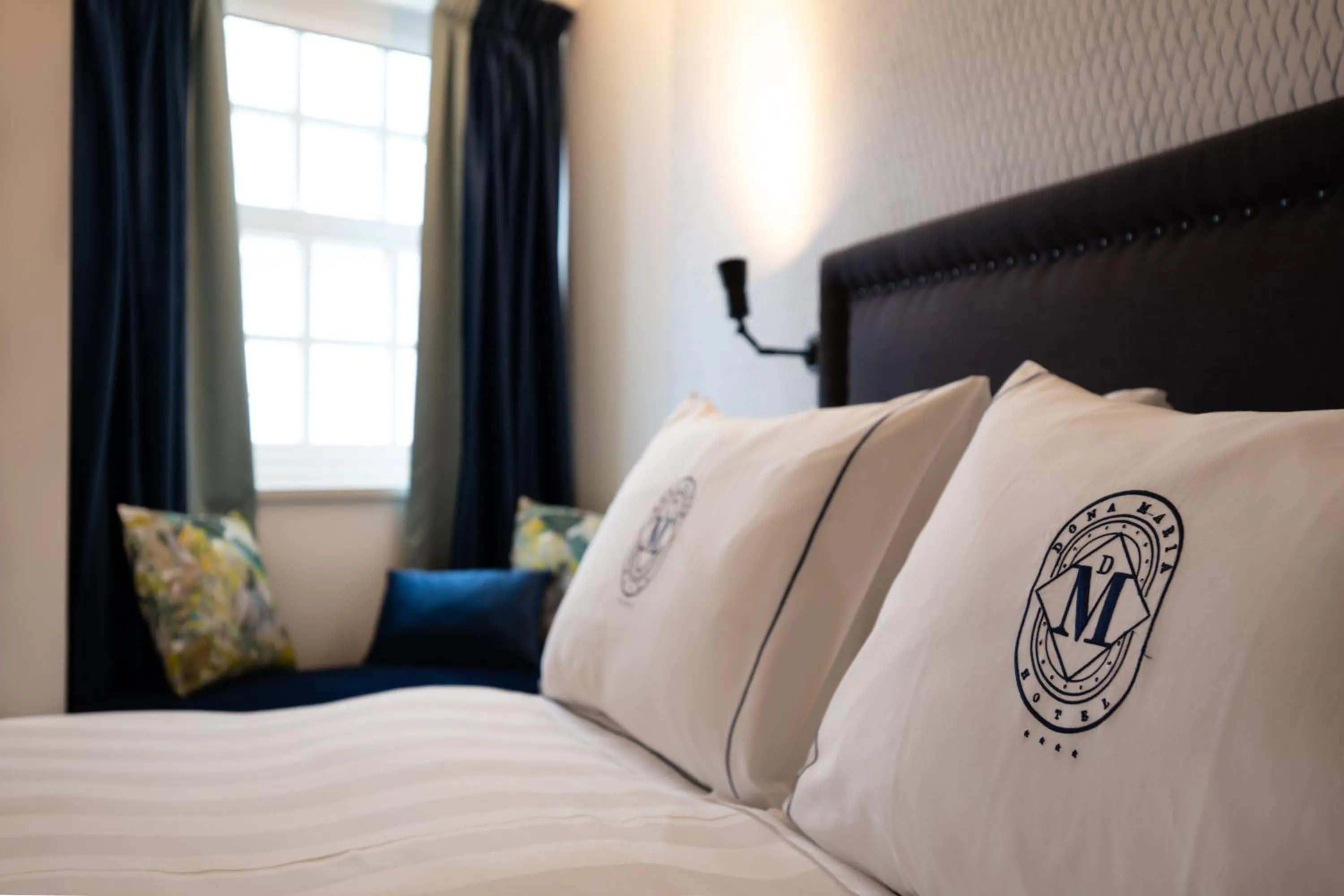 Bed in Dona Maria Hotel