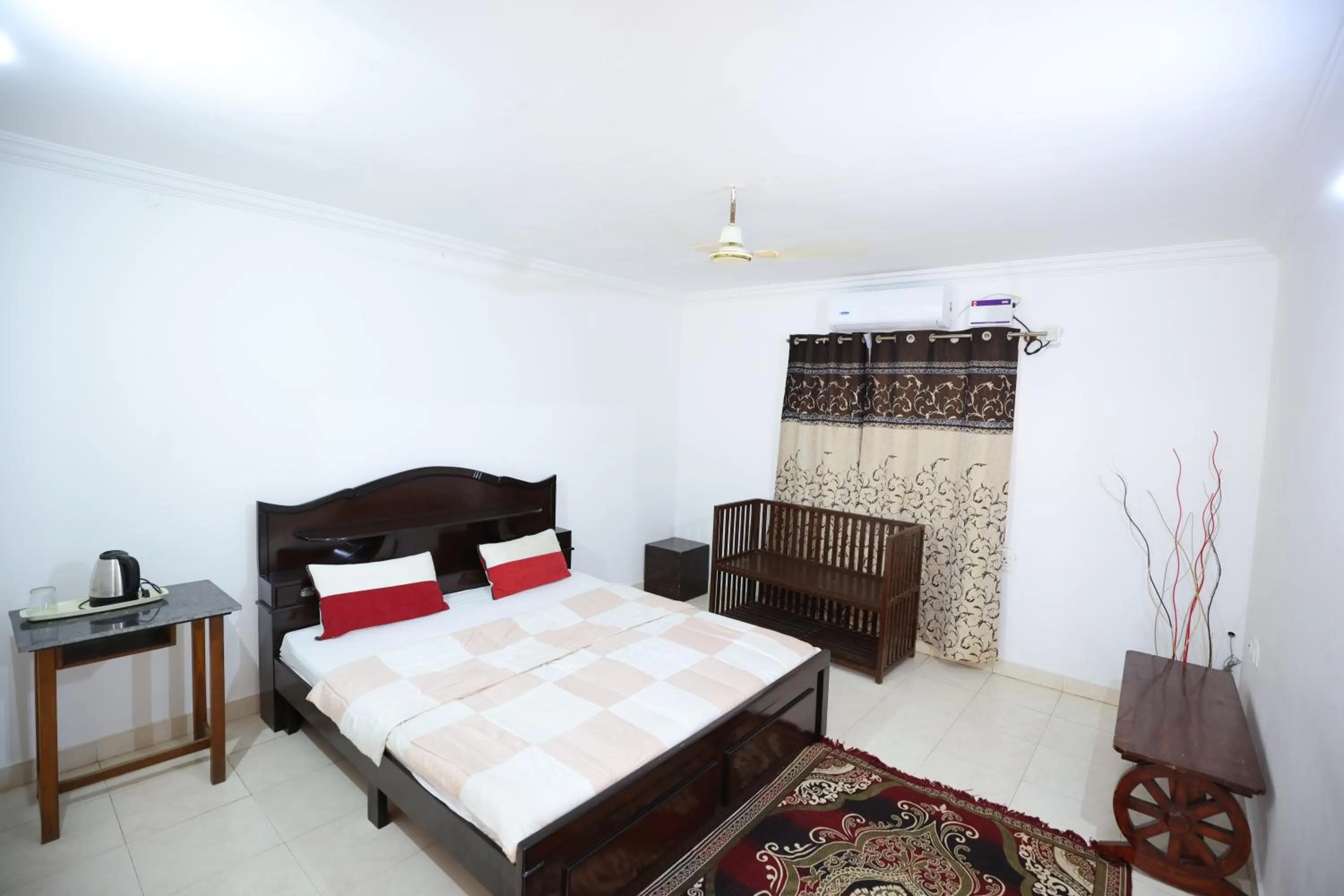 Bed in Nisarga Resort