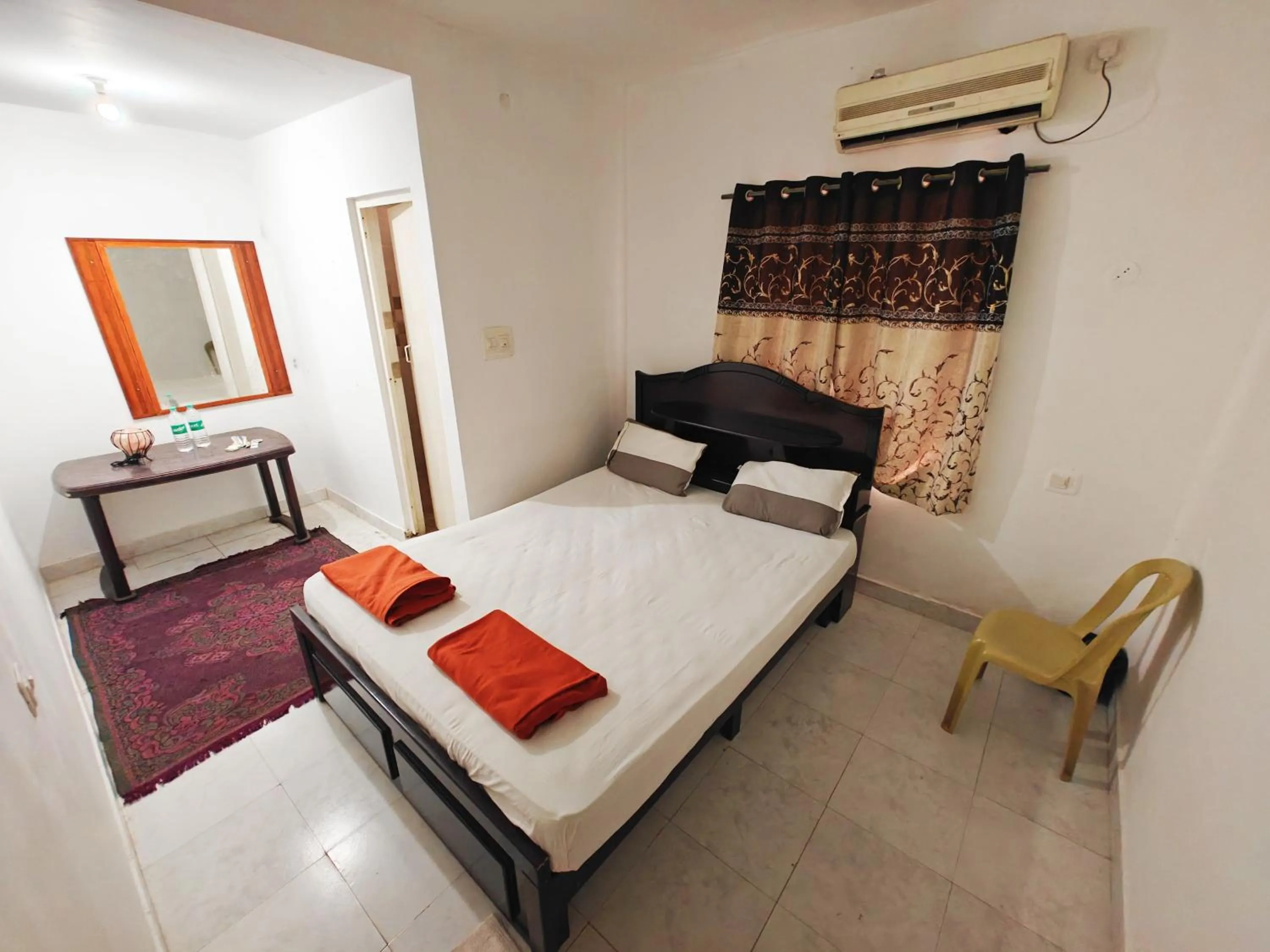 Bed in Nisarga Resort