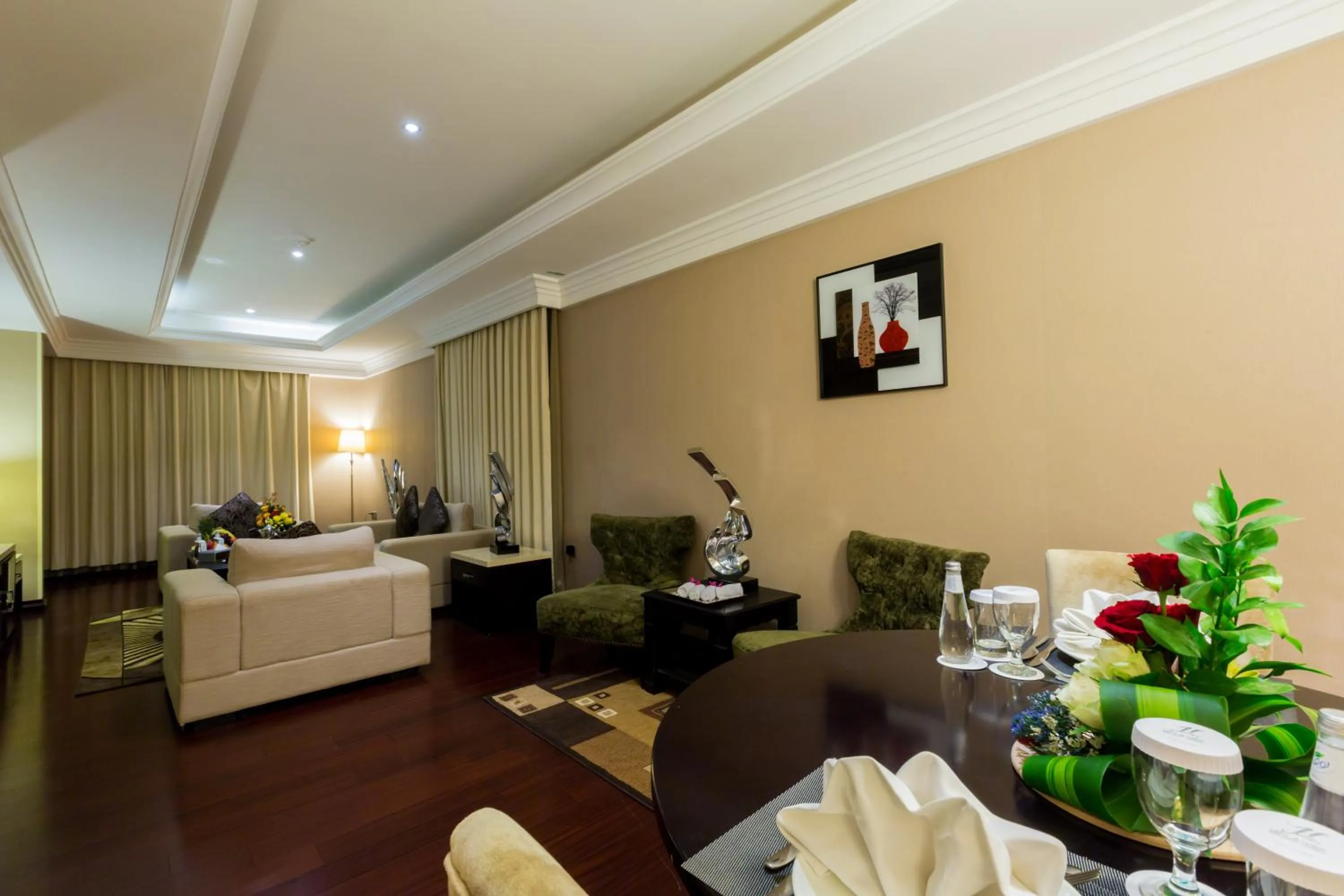 Living room, Bed in Holiday Jazan Hotel