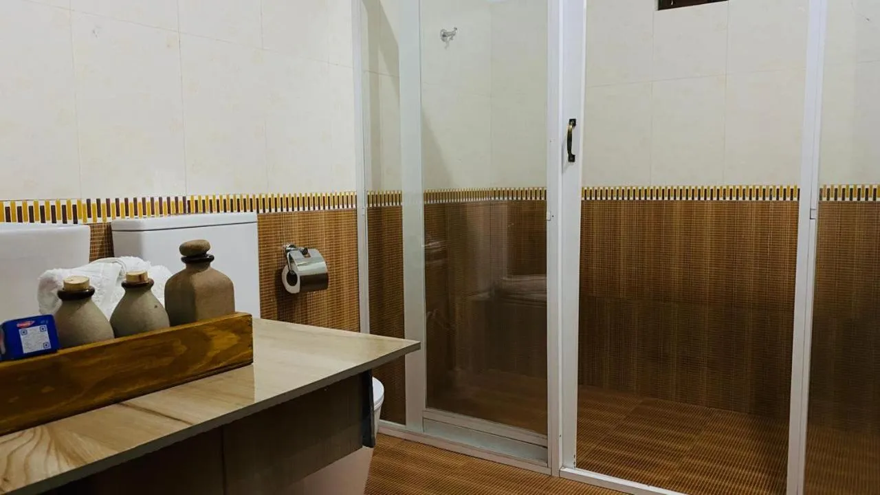 Shower in TEARAMB HOLIDAY BUNGALOW