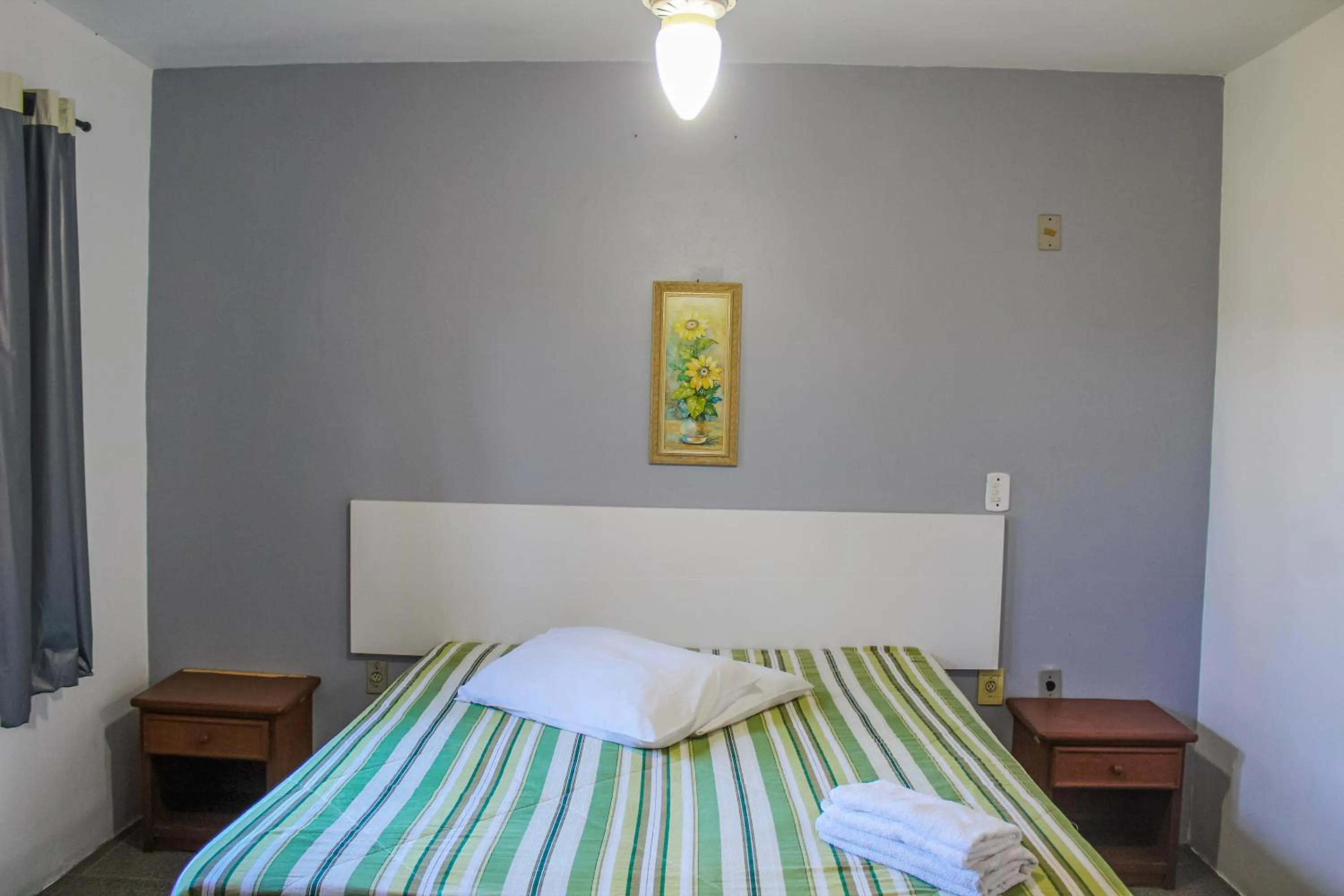 Bedroom in Serramar Apart Hotel