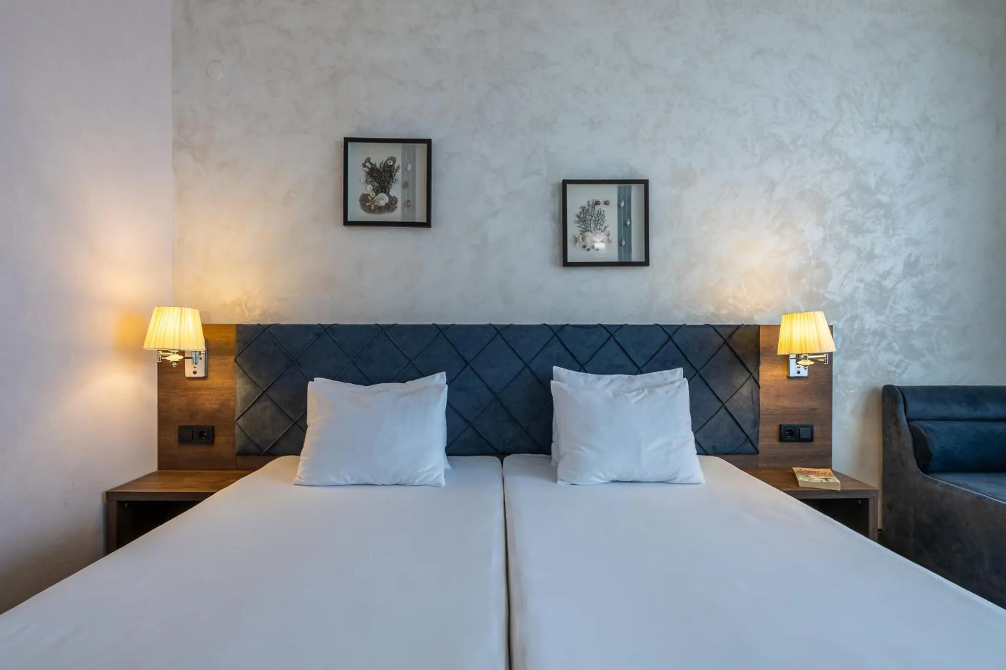 Bed in Flamingo Beach Hotel