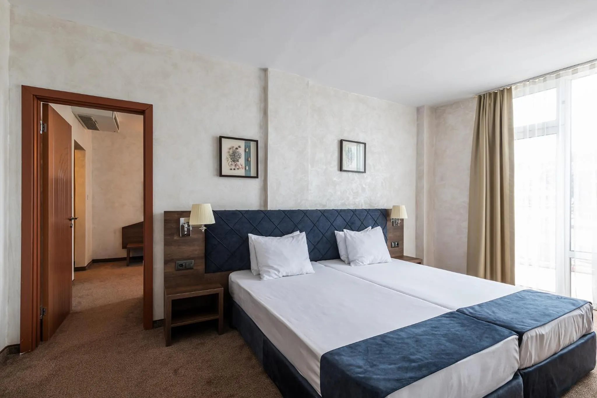 Bed in Flamingo Beach Hotel