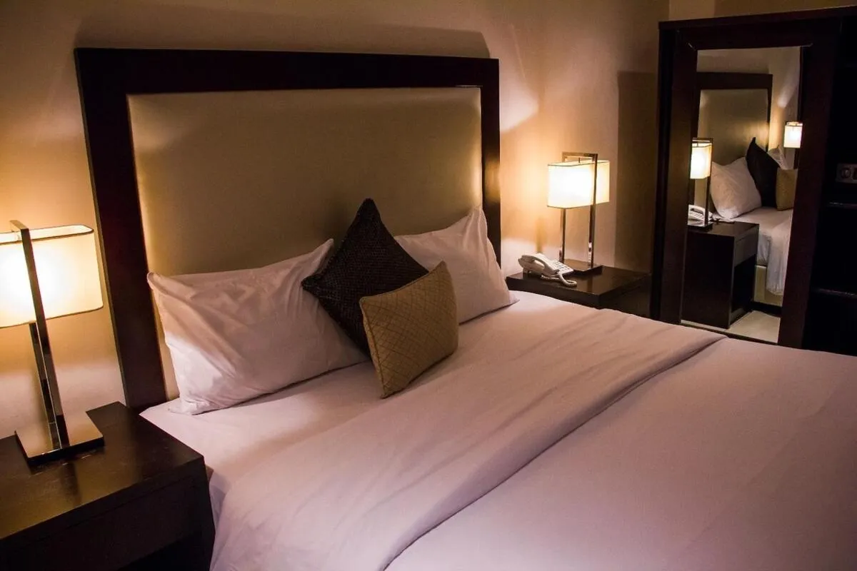 Bed in S & S Hotel & Suites