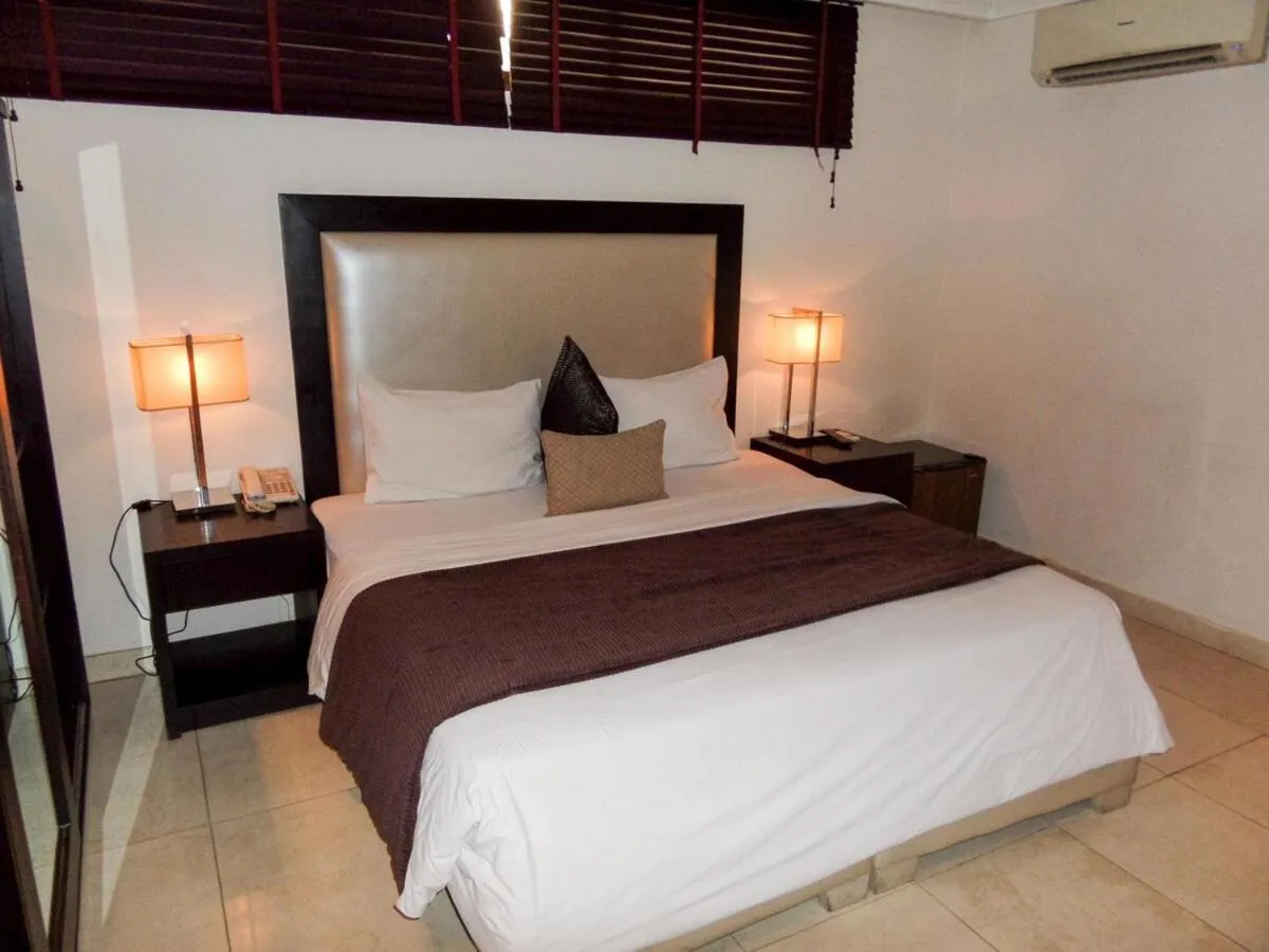 Bed in S & S Hotel & Suites