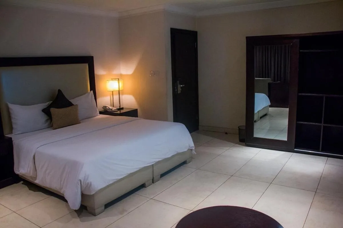 Bed in S & S Hotel & Suites