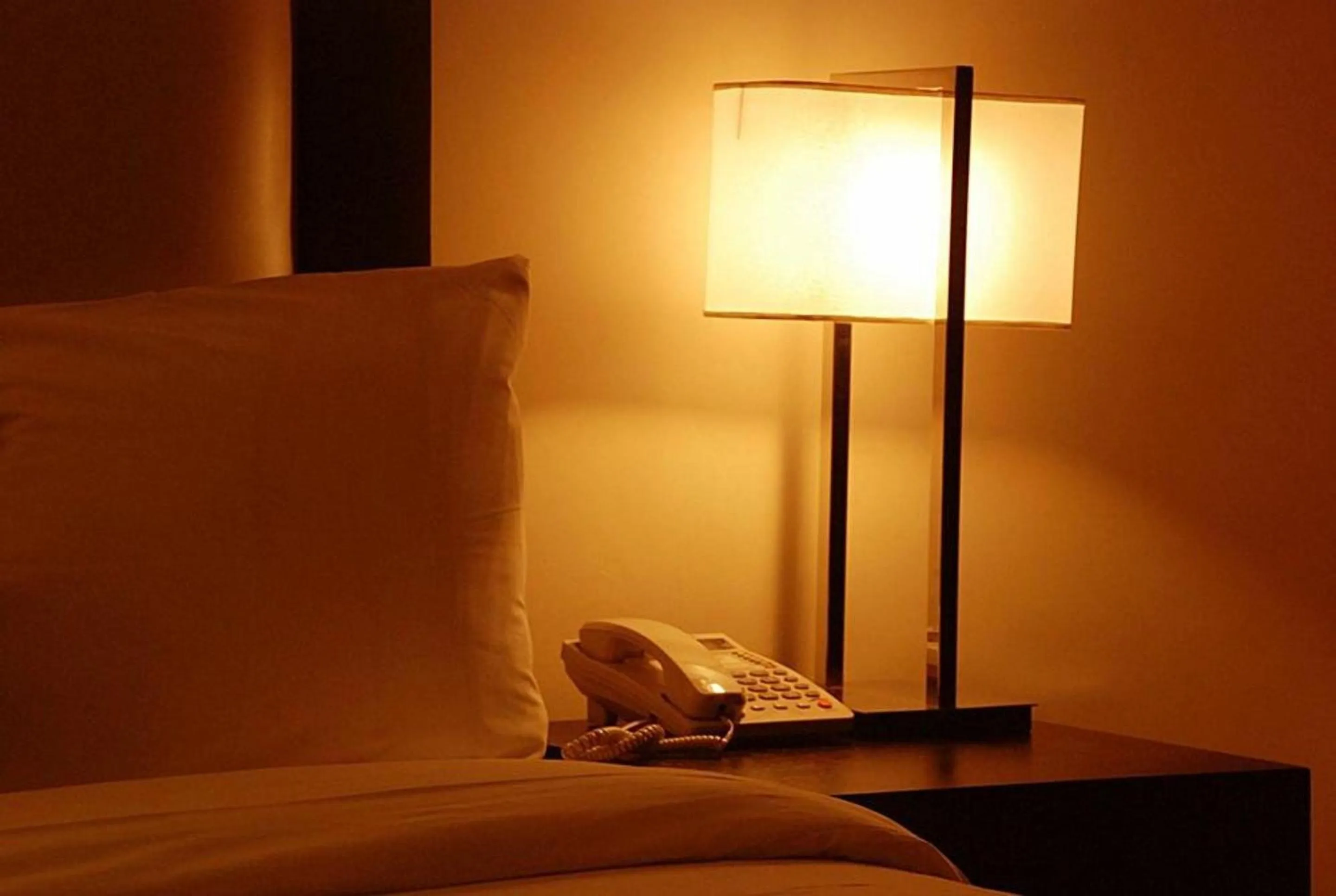 Bed in S & S Hotel & Suites