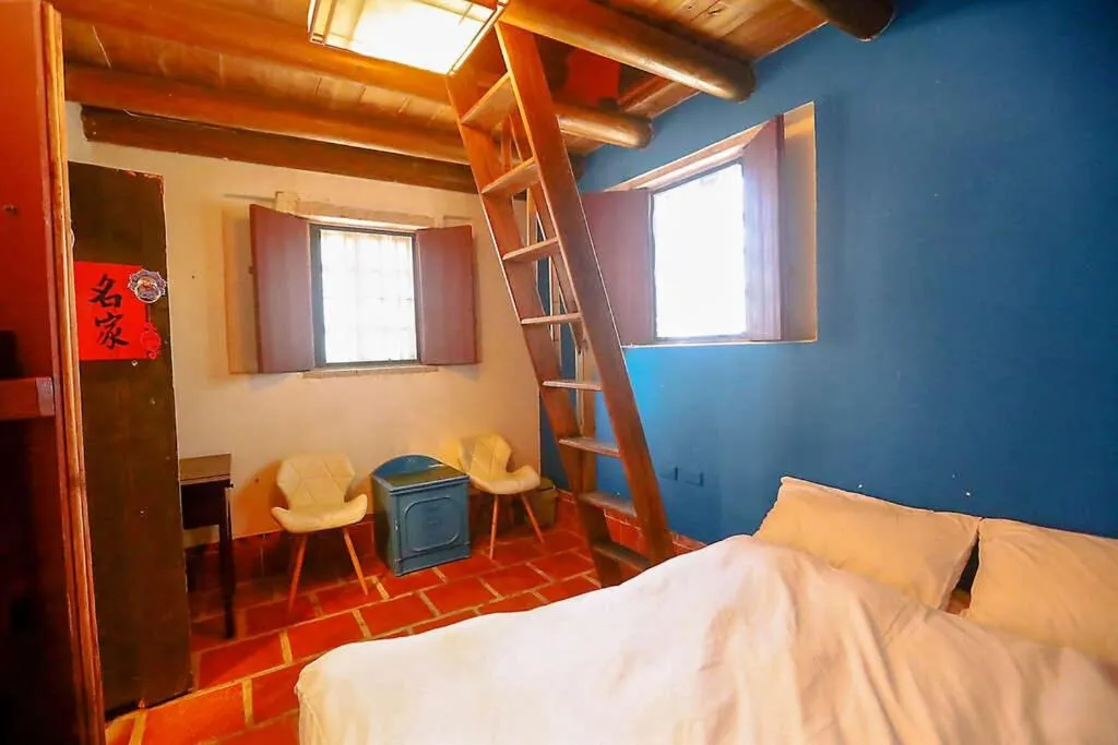 Bed in 鳥藝古厝民宿