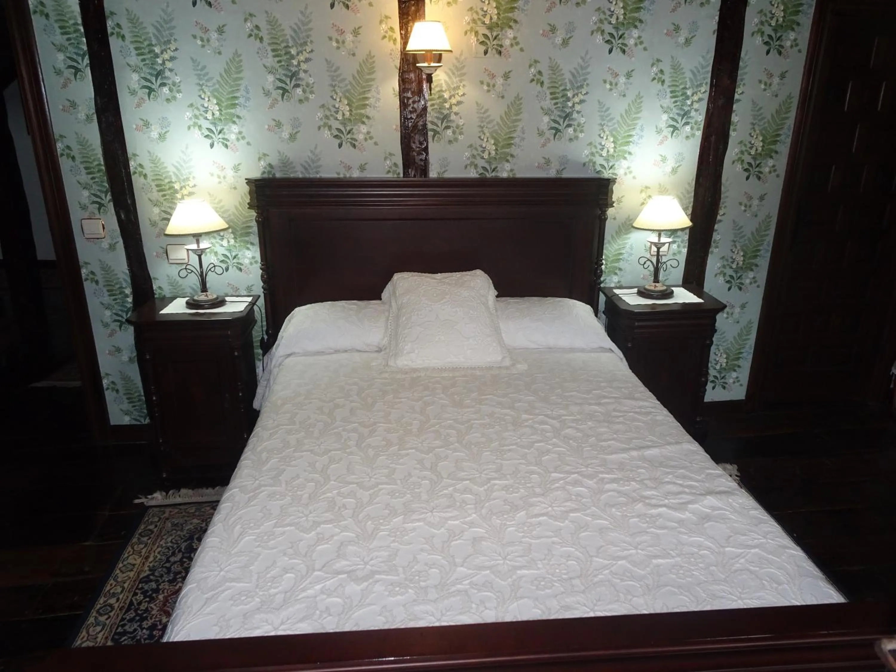 Bed in LA CASONA DE ESCALADA