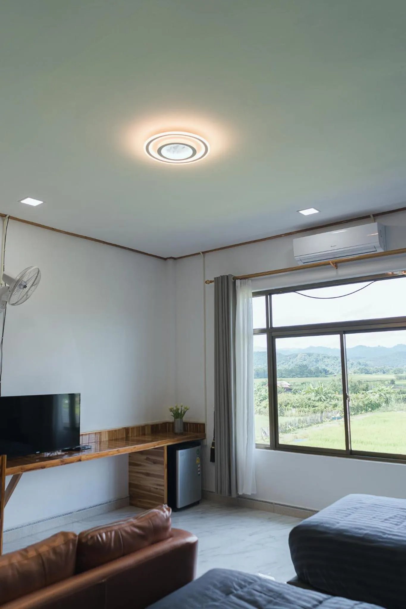 Communal lounge/ TV room in Tulip Hotel