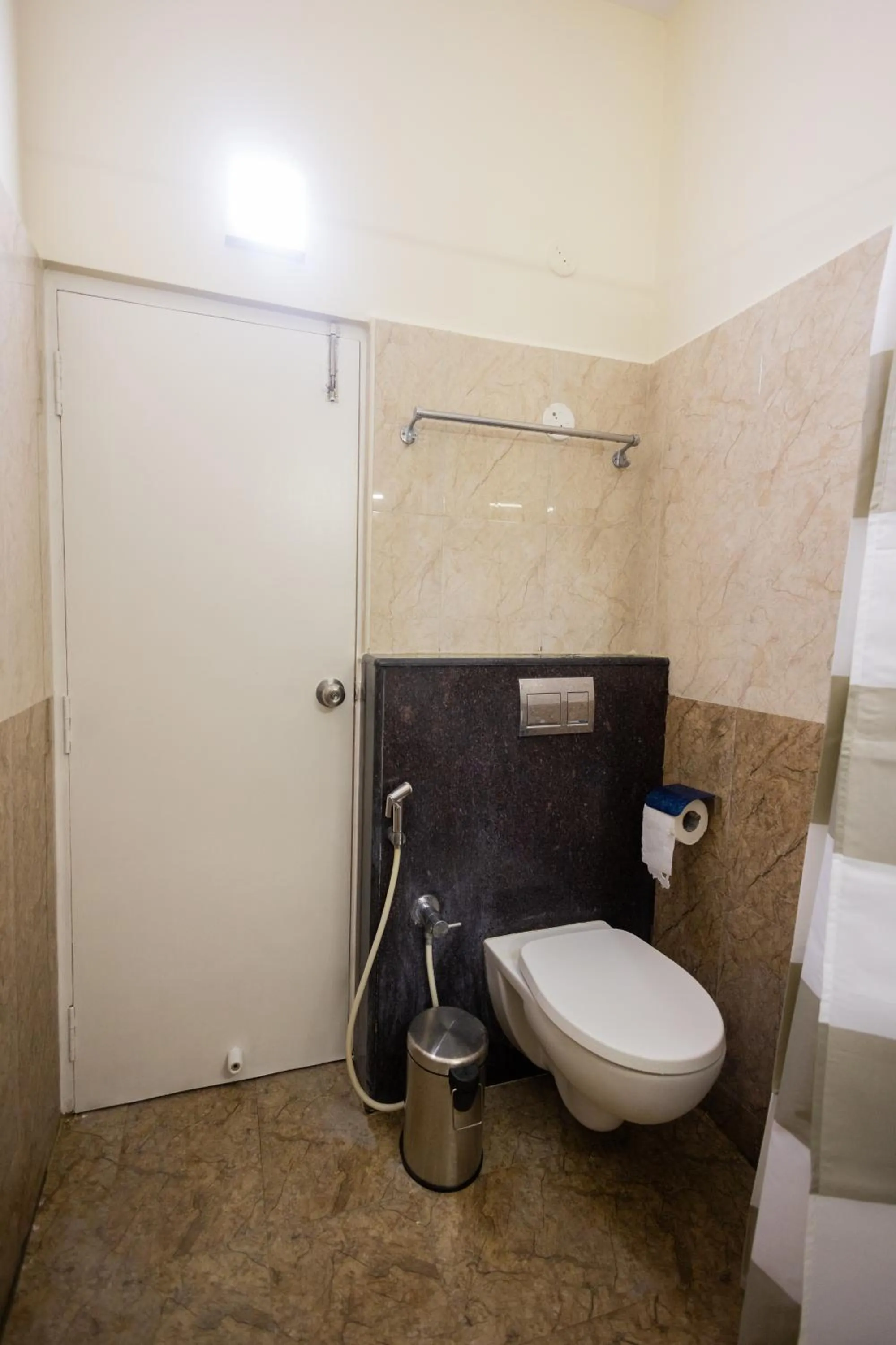 Bathroom in Suraksha Stay Brookfield Hotel