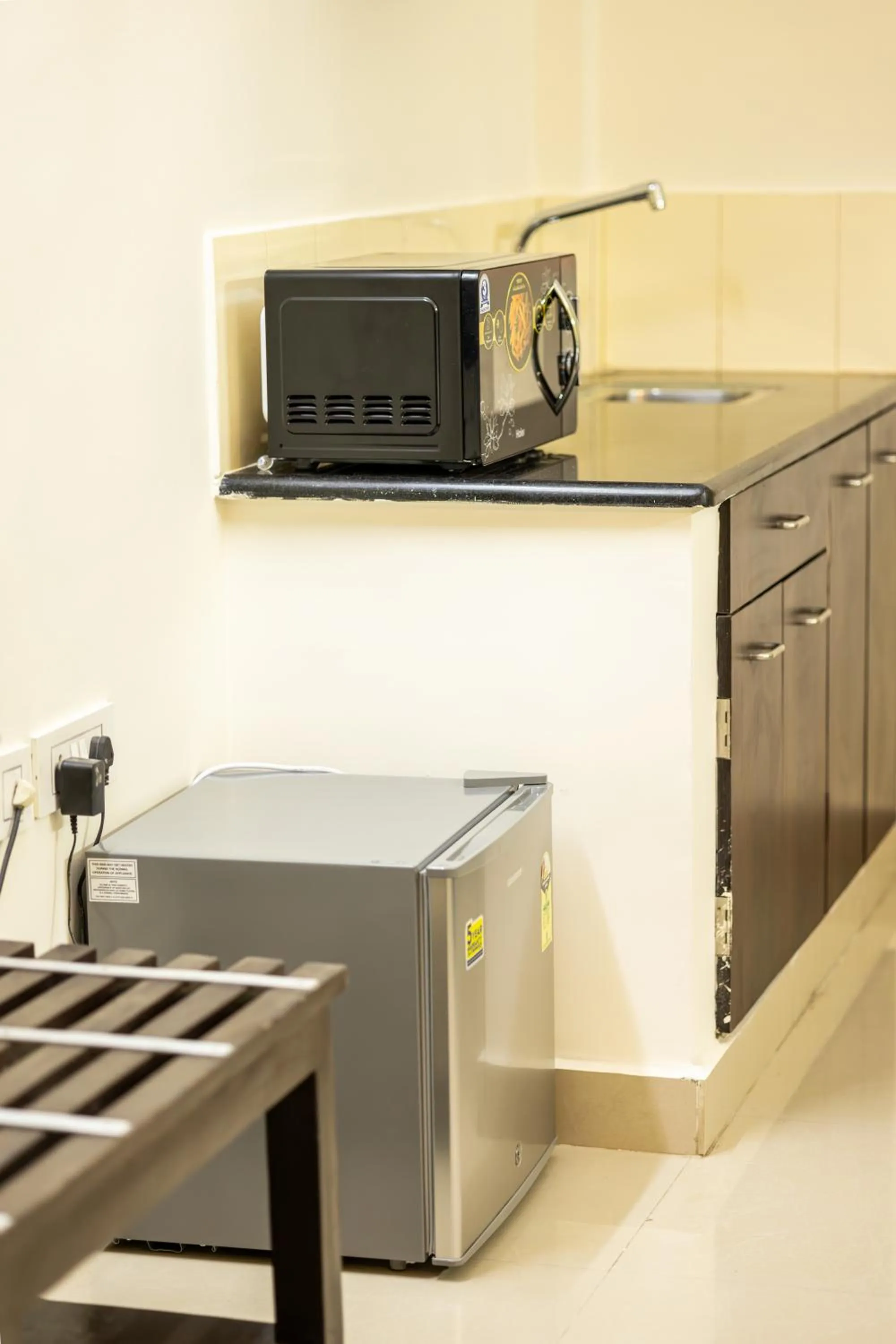 Kitchen or kitchenette in Suraksha Stay Brookfield Hotel