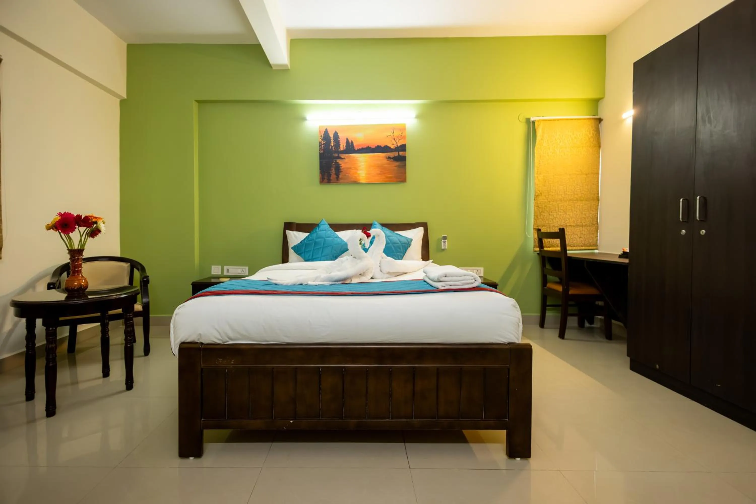 Bed in Suraksha Stay Brookfield Hotel