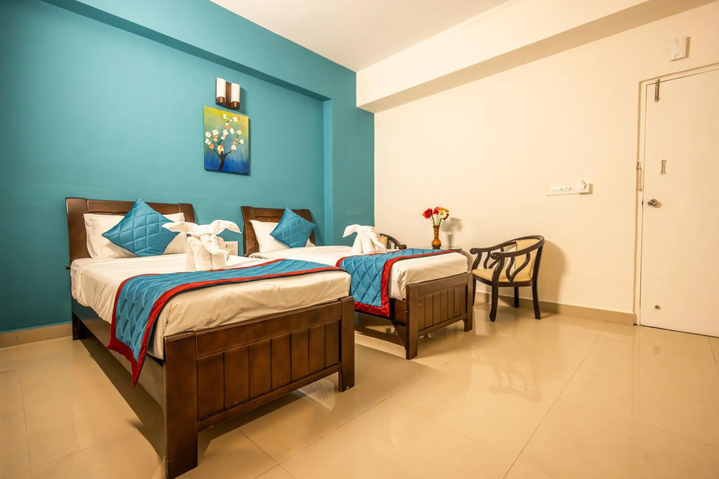 Bed in Suraksha Stay Brookfield Hotel