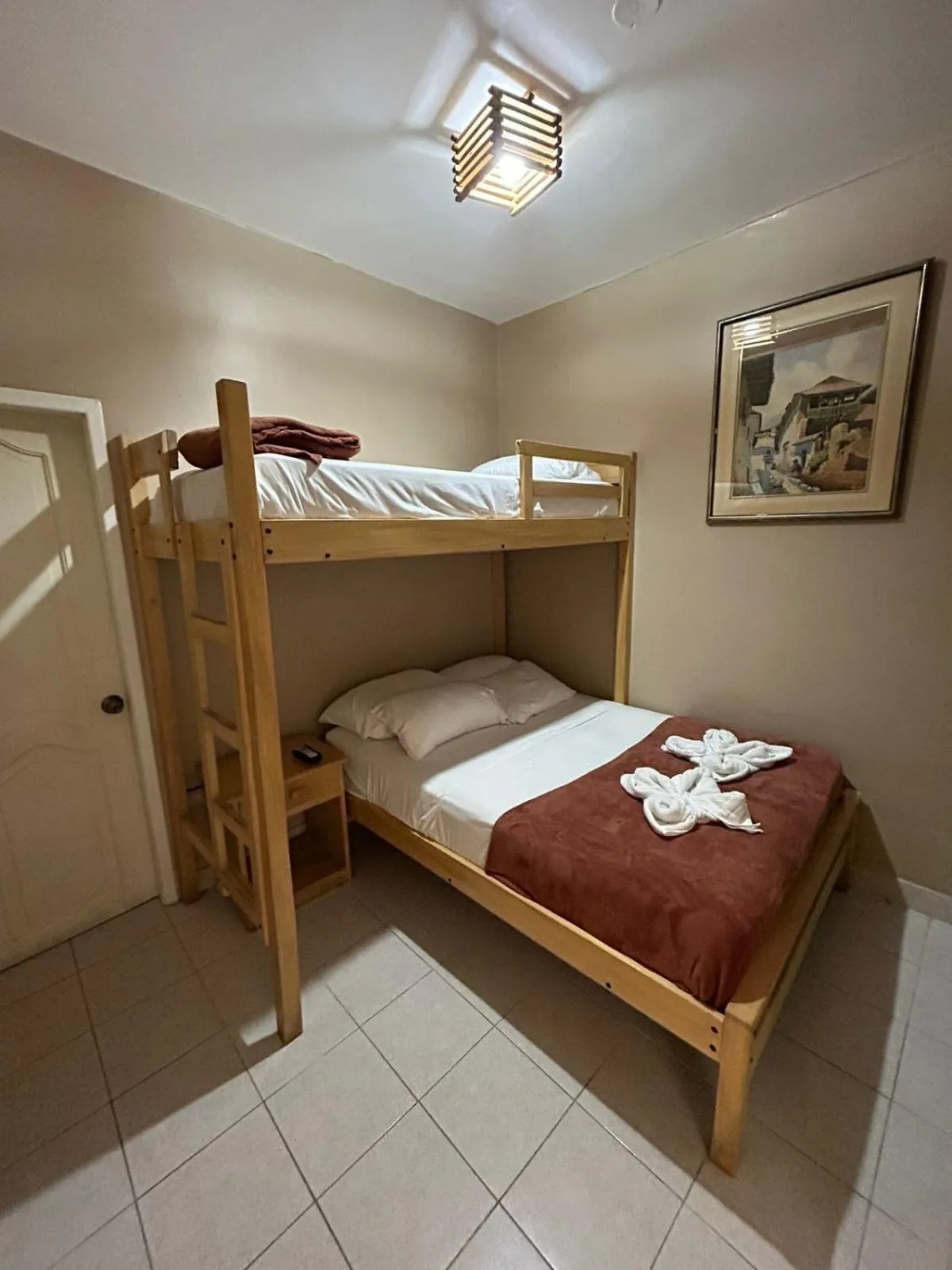 Bed in Chescos Hotel