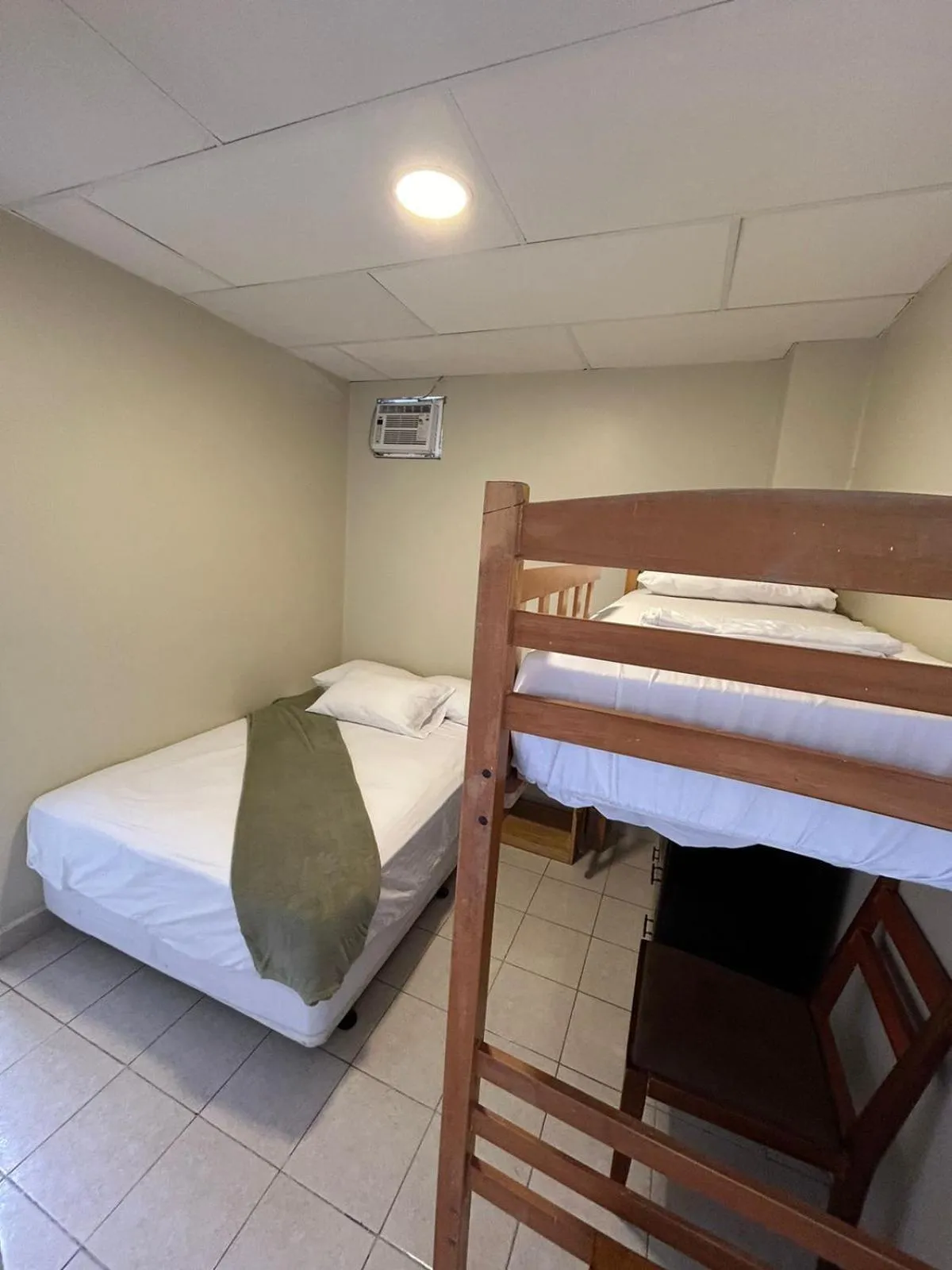 Bed in Chescos Hotel