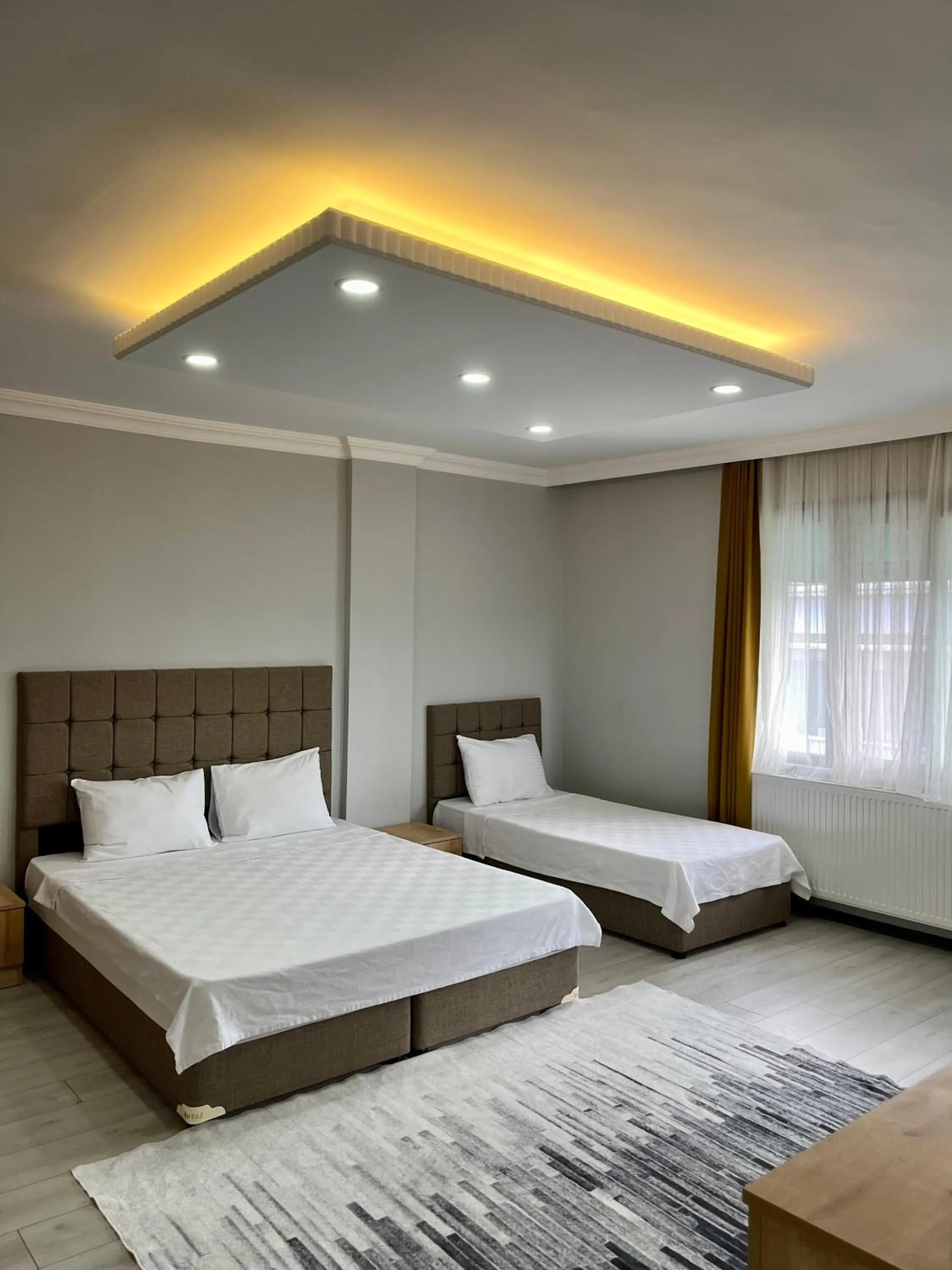 Bed in Ozn Suit Airport Hotel