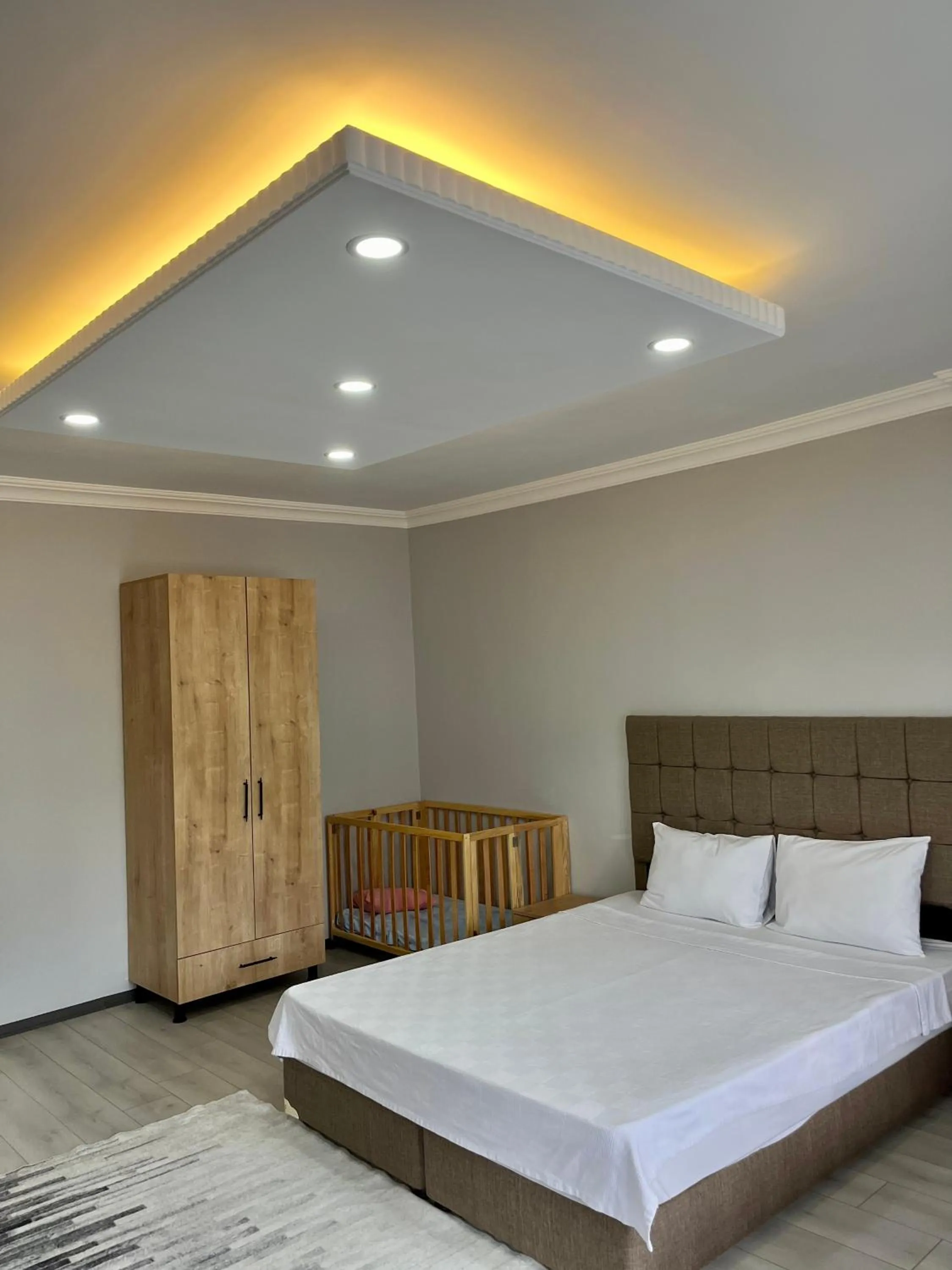 Bed in Ozn Suit Airport Hotel