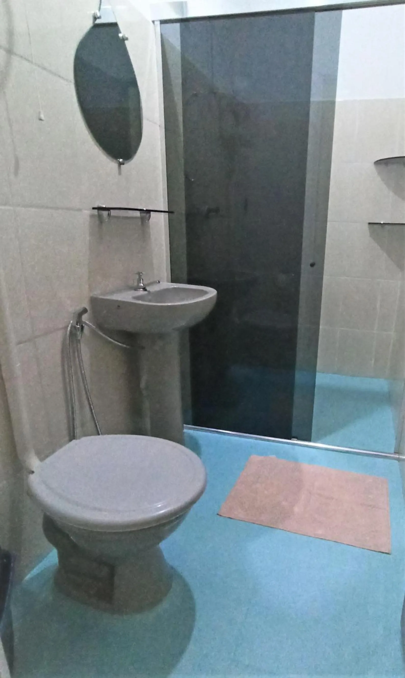 Toilet in Hotel Coração Verde