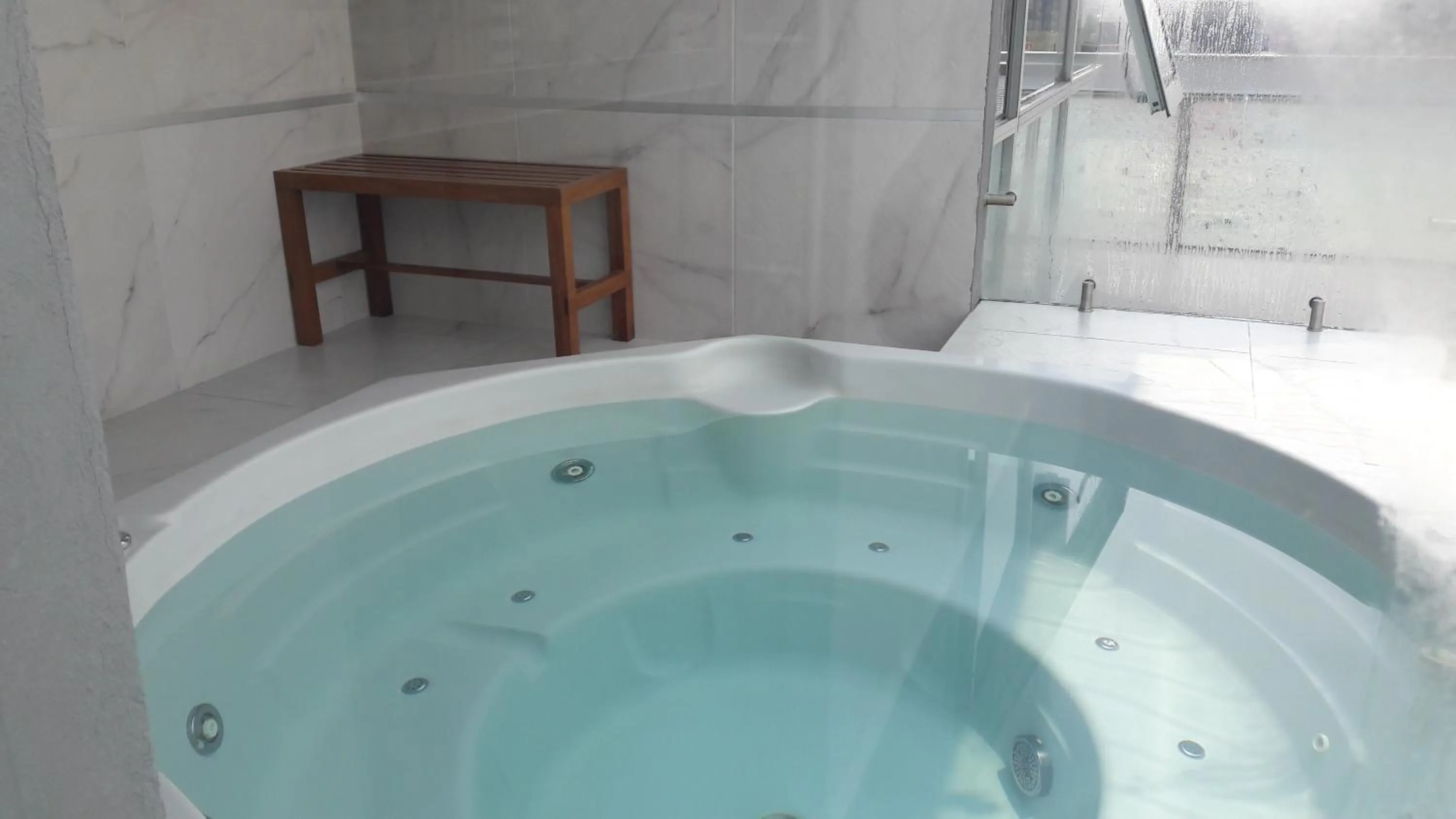 Hot Tub in Hotel Block Suites