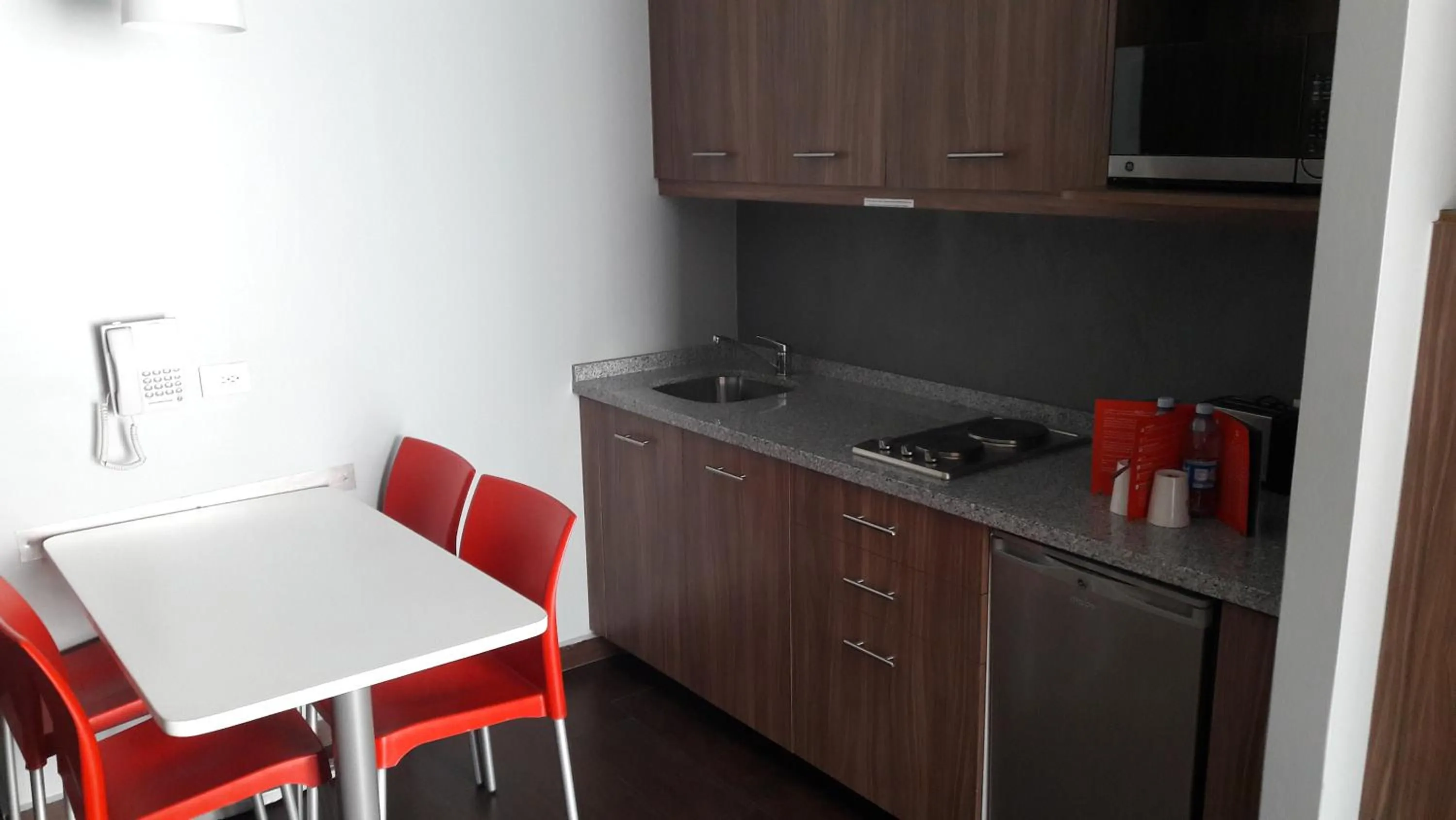 Kitchen or kitchenette in Hotel Block Suites