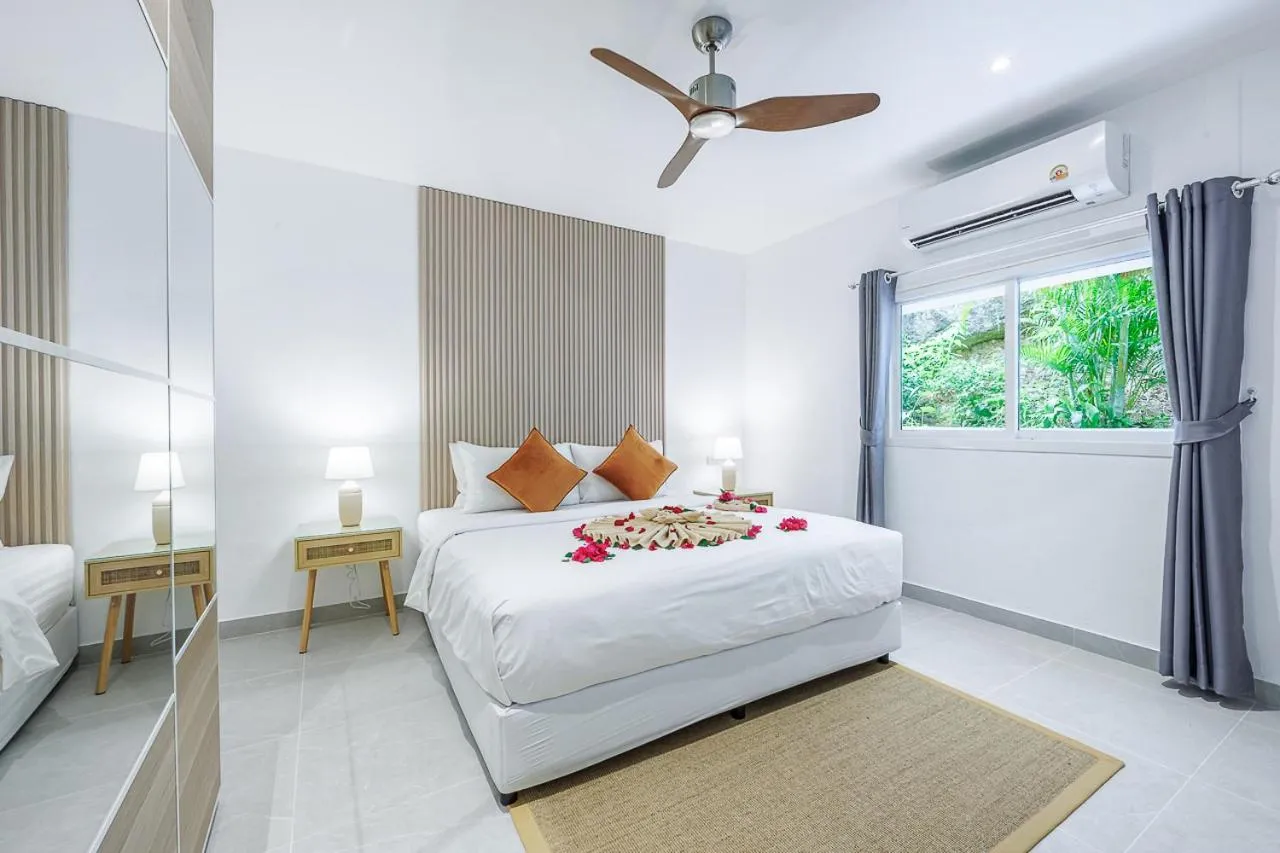 Bed in Baan Saint-Tropez Seaview Villas Kata Beach