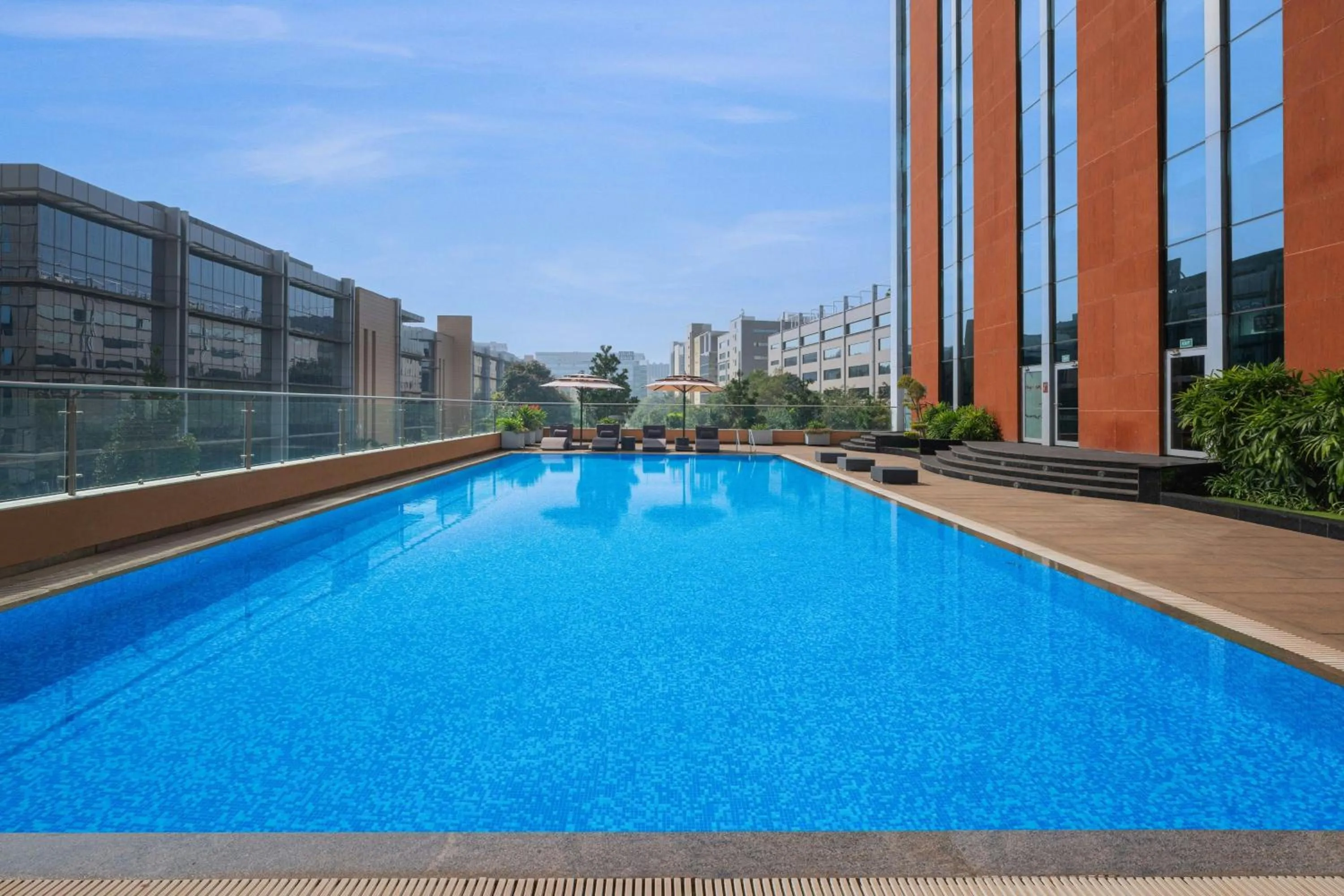 Swimming pool in Aloft Bengaluru Outer Ring Road