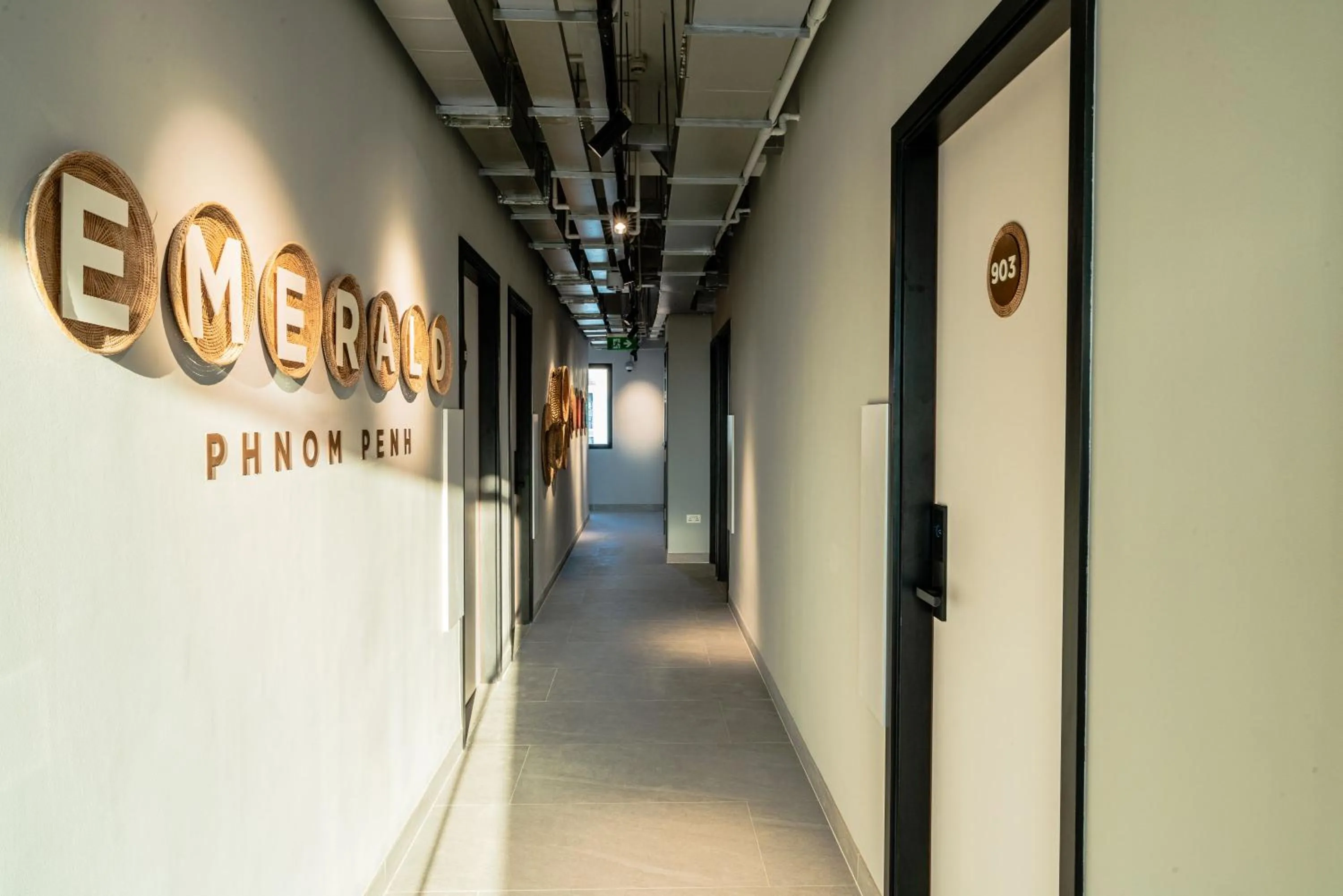 Property logo or sign in Emerald Hotel Residence