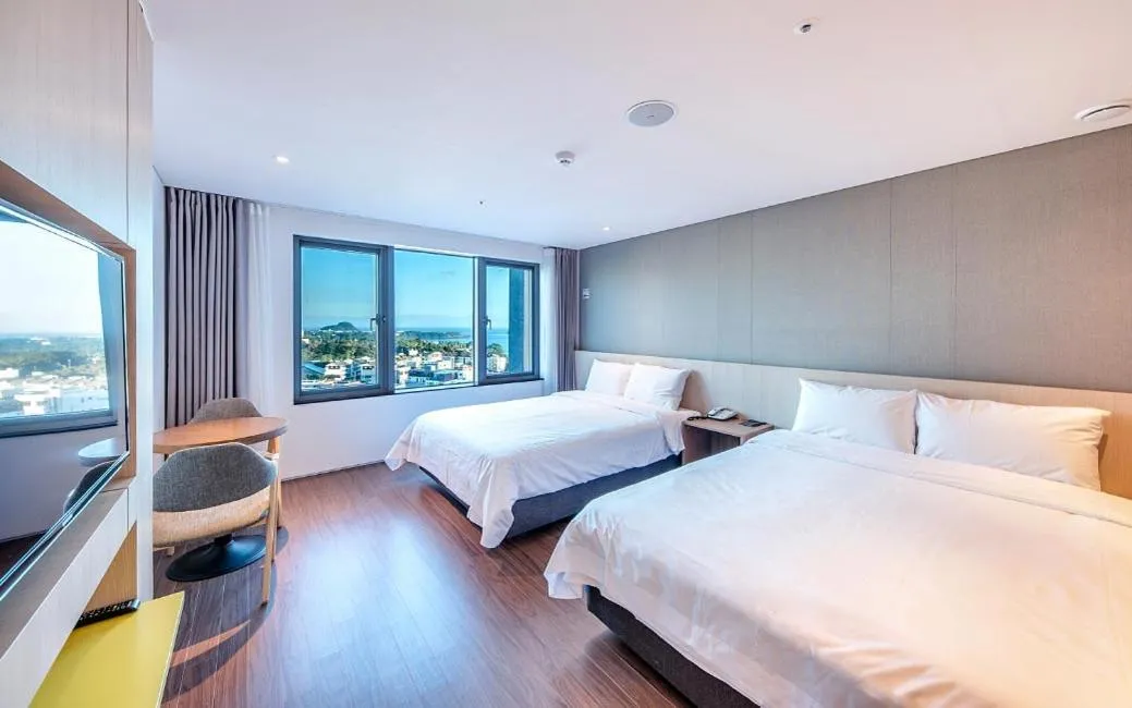 Bed in Noblepia Hotel