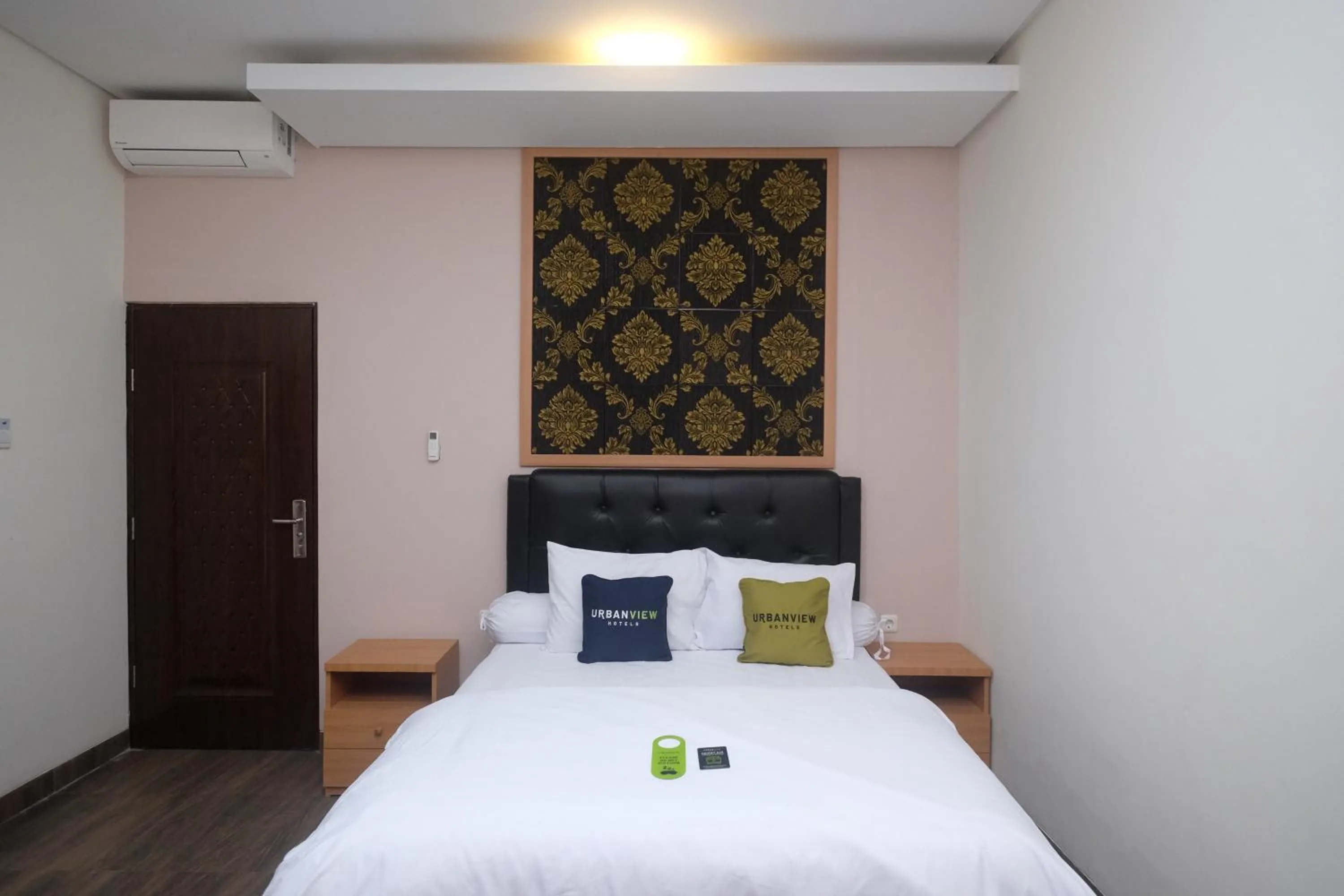 Bedroom, Bed in Urbanview Grand Lotus Hotel by RedDoorz