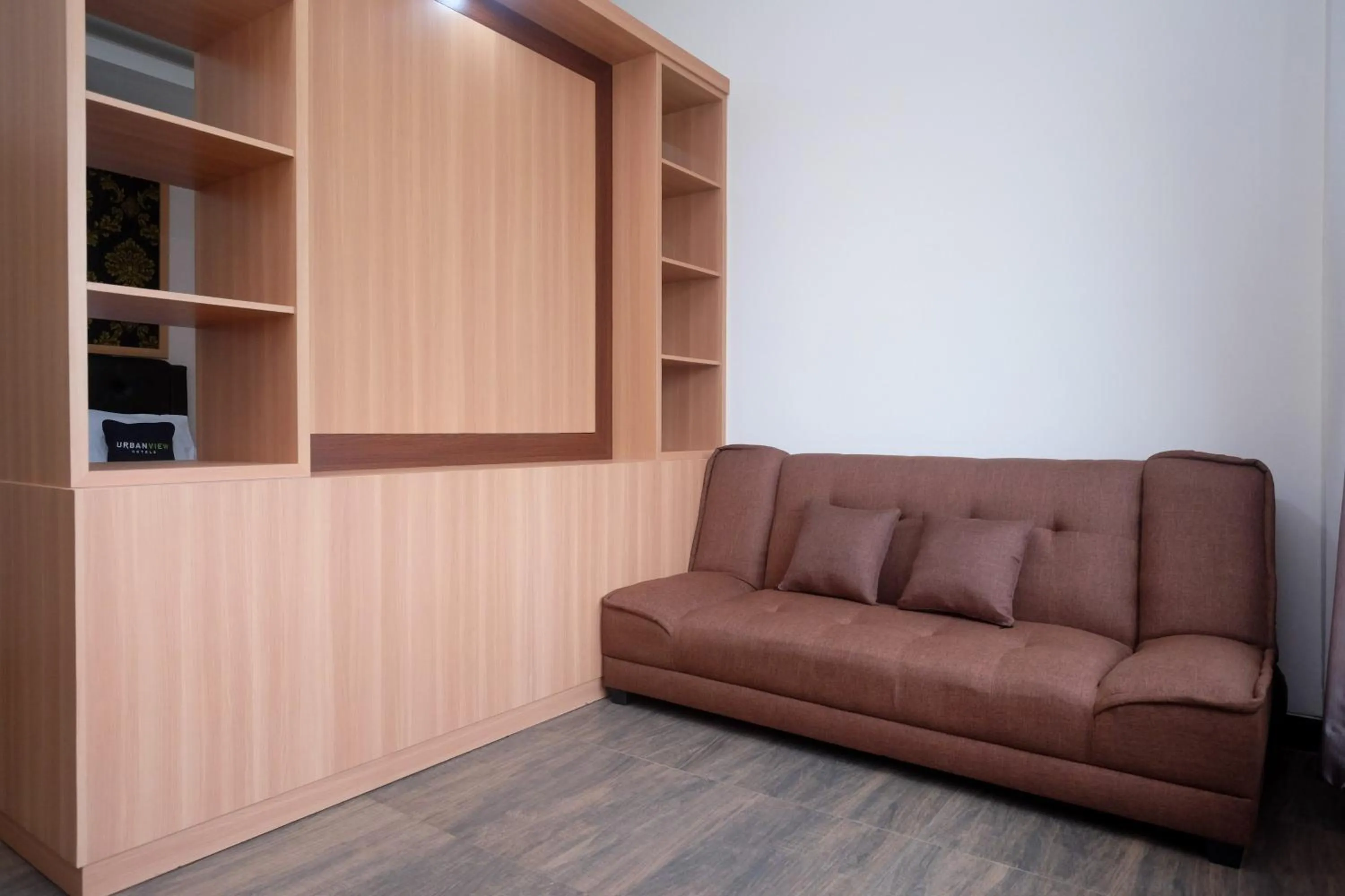 Seating area in Urbanview Grand Lotus Hotel by RedDoorz