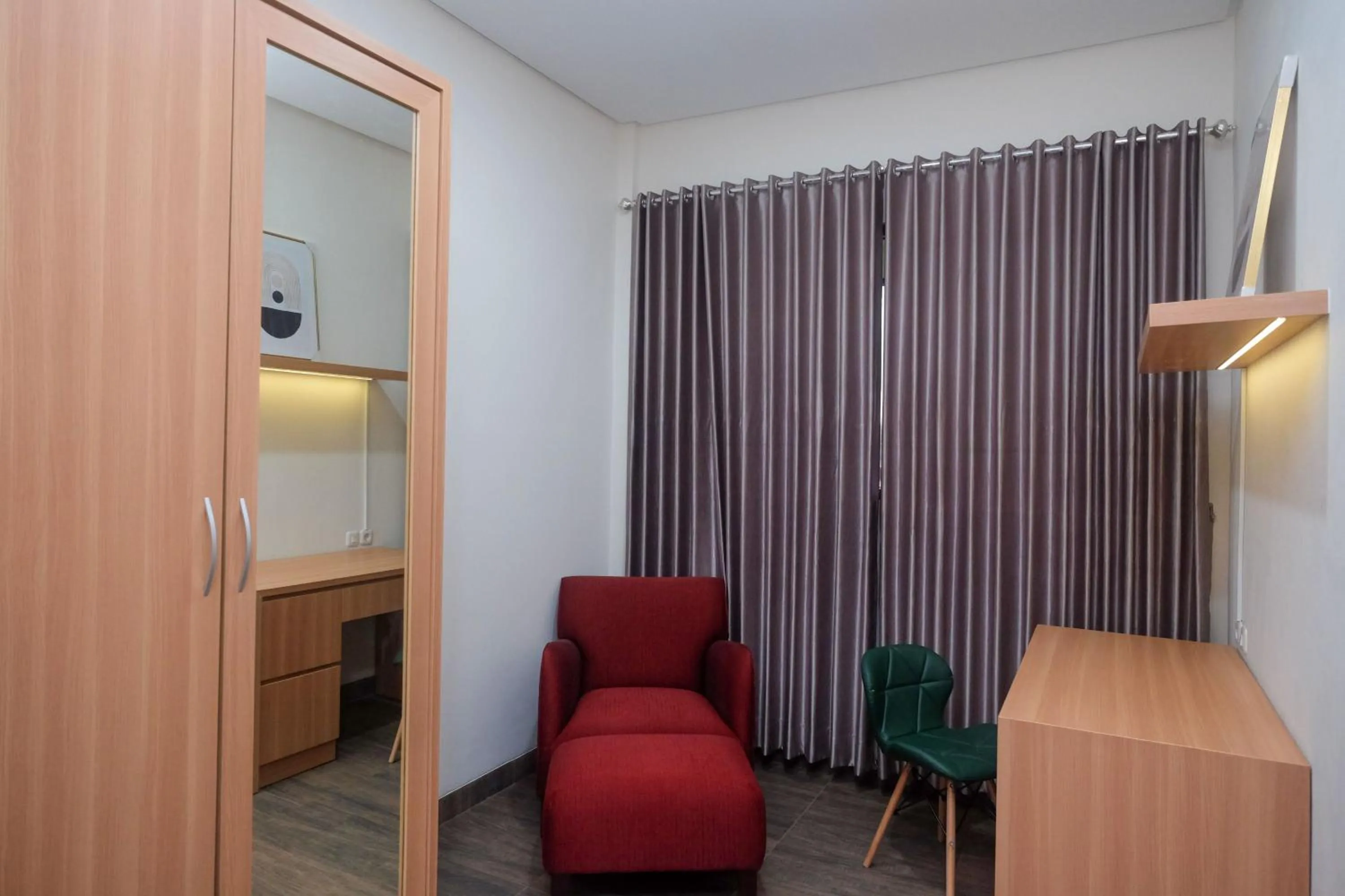 Seating area in Urbanview Grand Lotus Hotel by RedDoorz