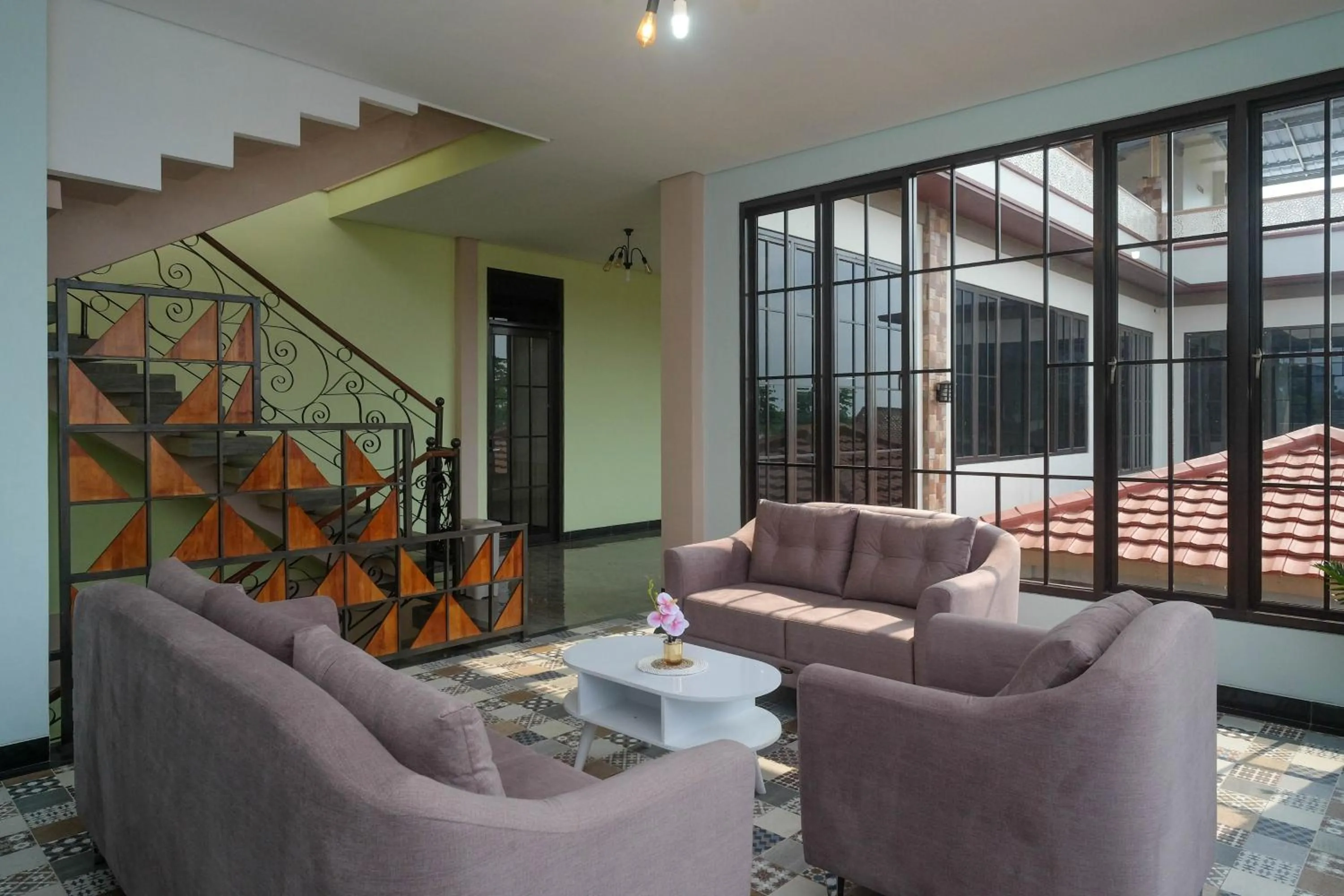 Seating area in Urbanview Grand Lotus Hotel by RedDoorz