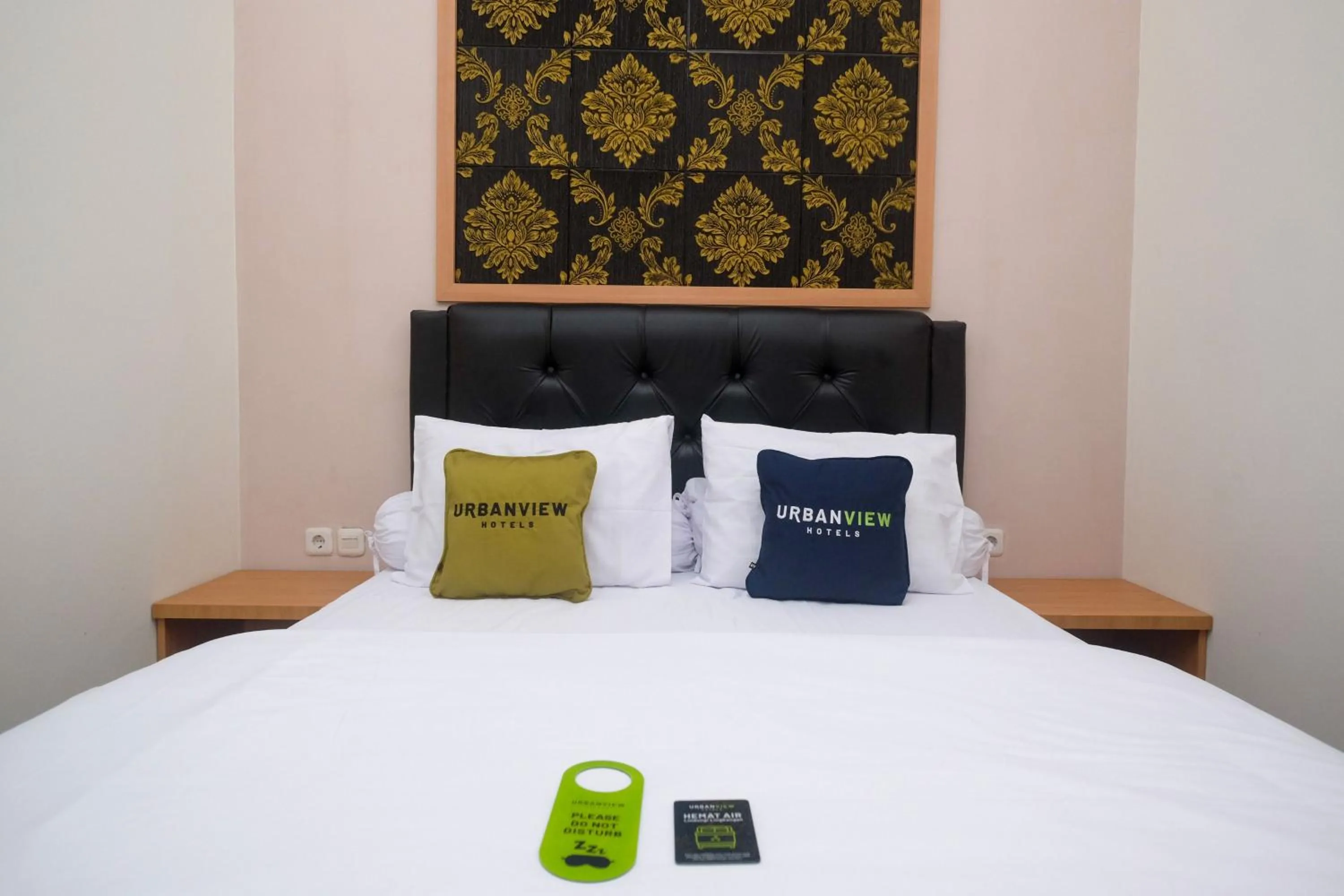 Bedroom, Bed in Urbanview Grand Lotus Hotel by RedDoorz