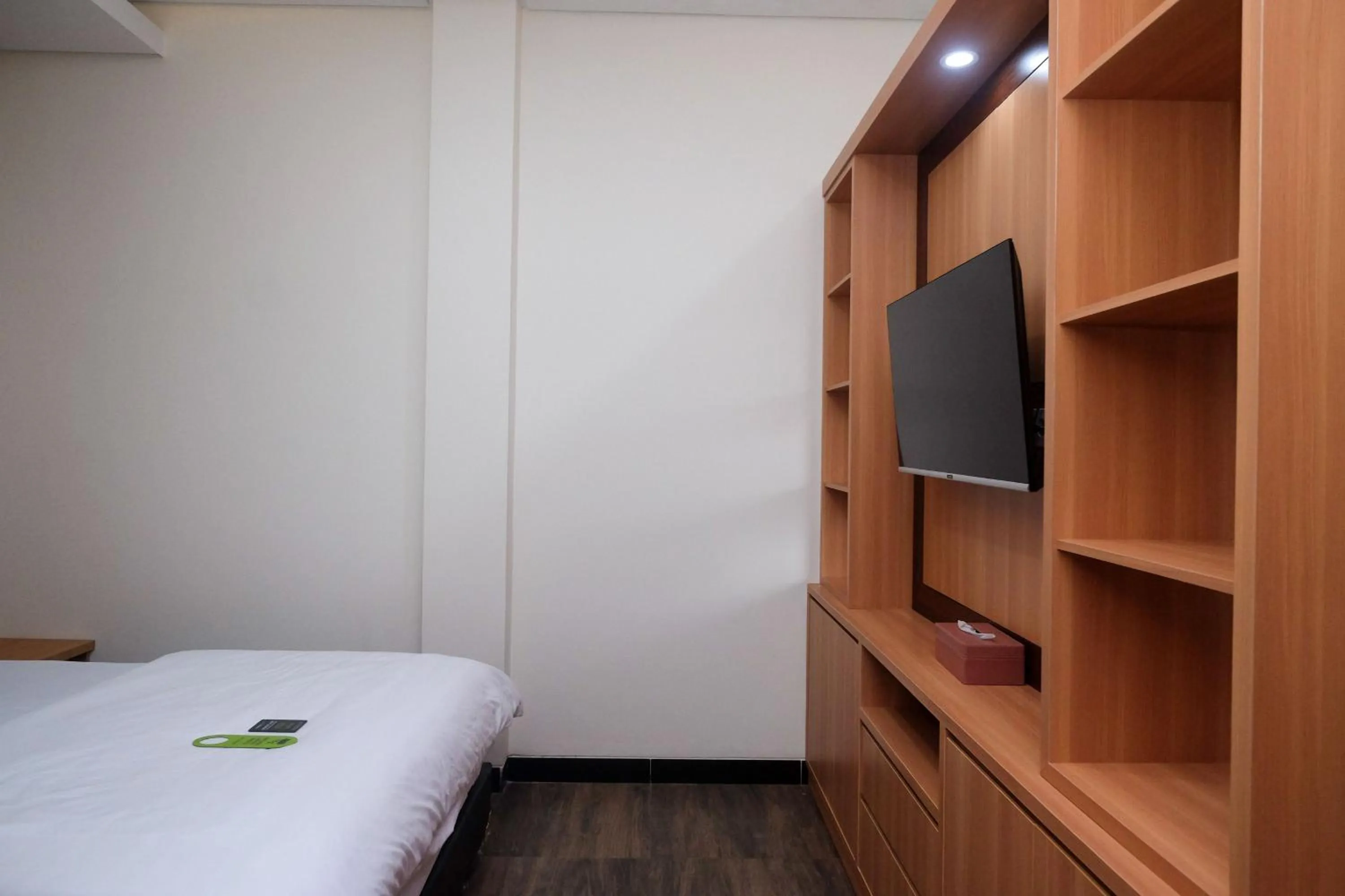 Bedroom, Bed in Urbanview Grand Lotus Hotel by RedDoorz