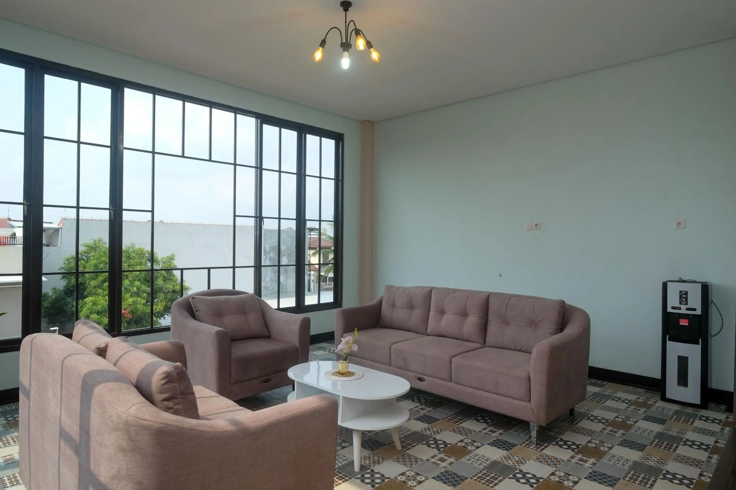 Seating area in Urbanview Grand Lotus Hotel by RedDoorz