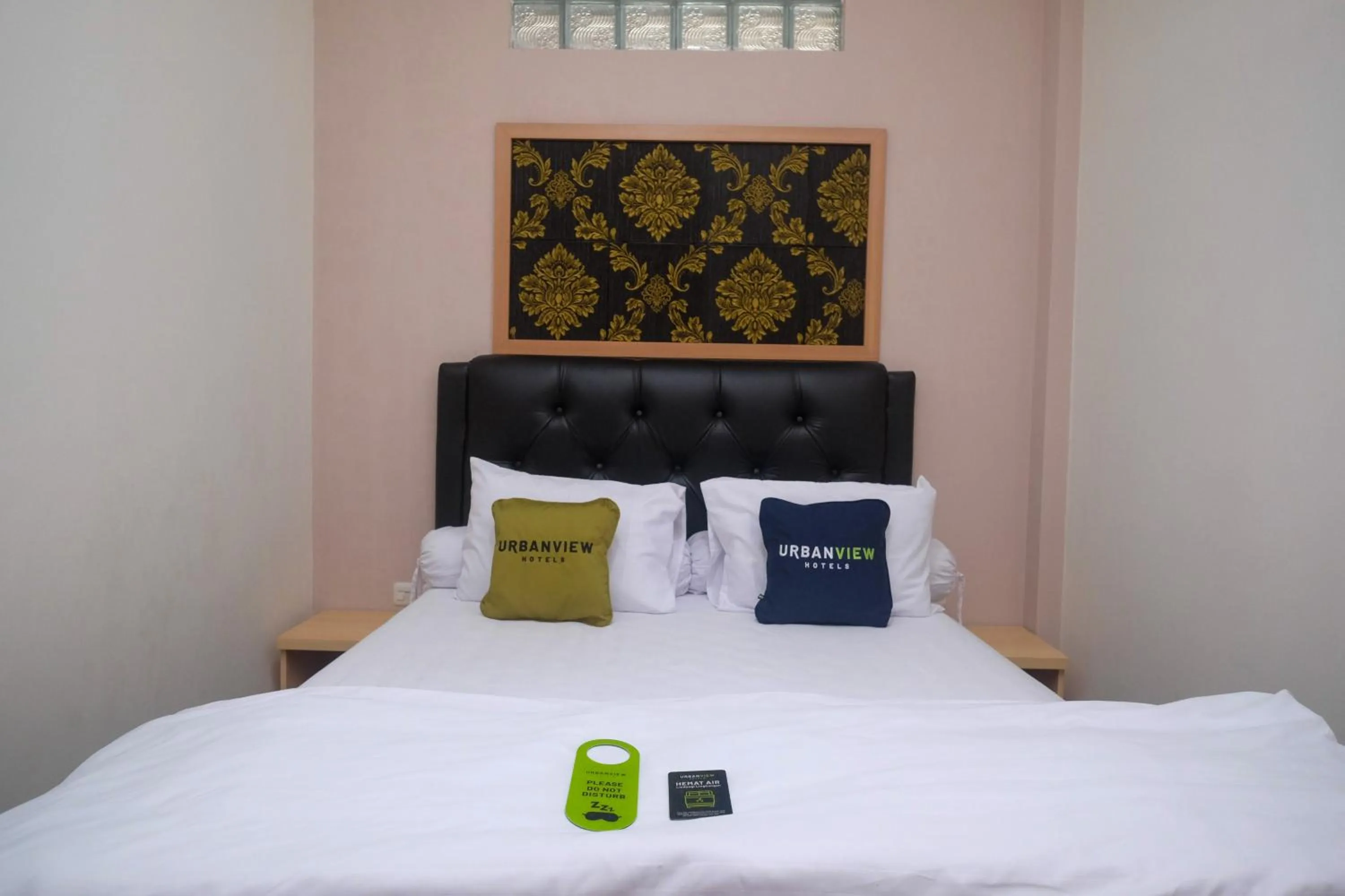 Bedroom, Bed in Urbanview Grand Lotus Hotel by RedDoorz