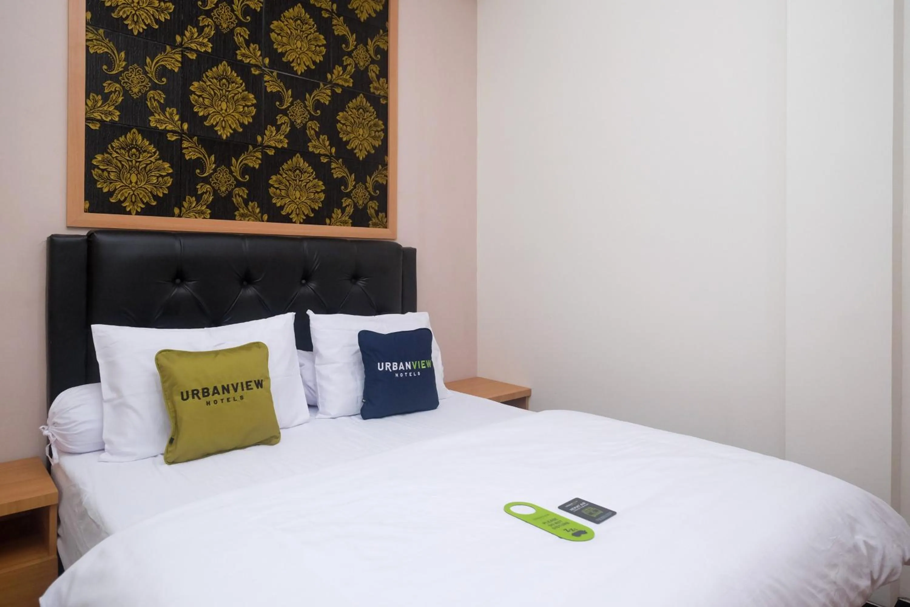 Bedroom, Bed in Urbanview Grand Lotus Hotel by RedDoorz